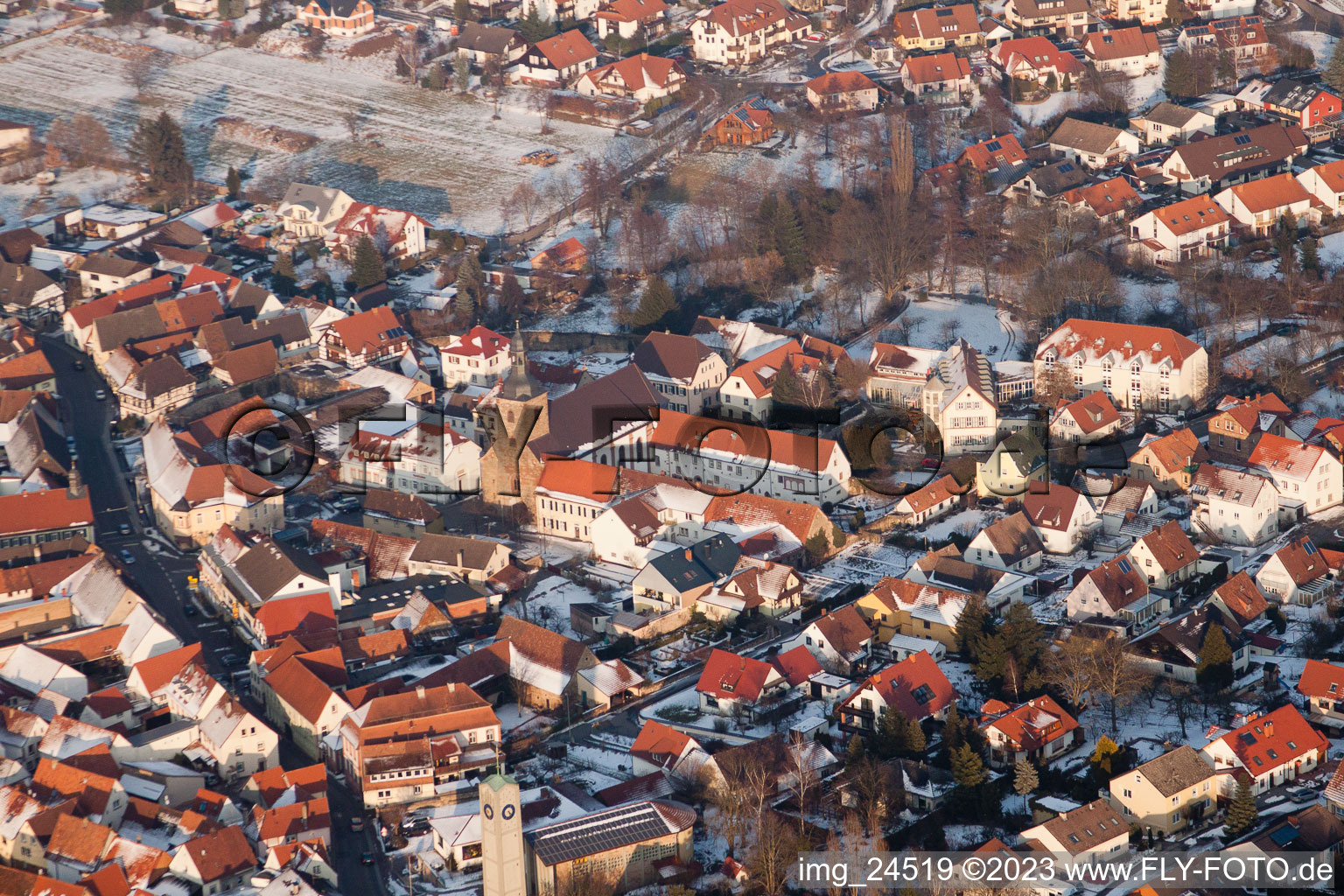 Winter snow-covered village in Klingenmünster in the state Rhineland-Palatinate, Germany