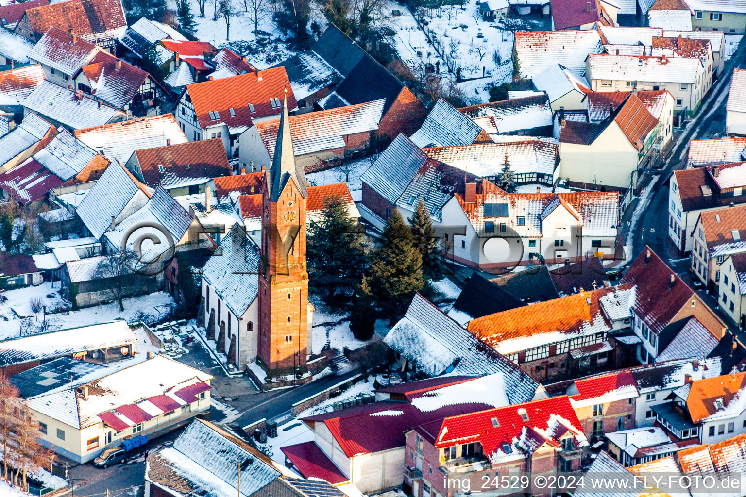 Wintry snowy Church building in the village of in Kapellen-Drusweiler in the state Rhineland-Palatinate, Germany