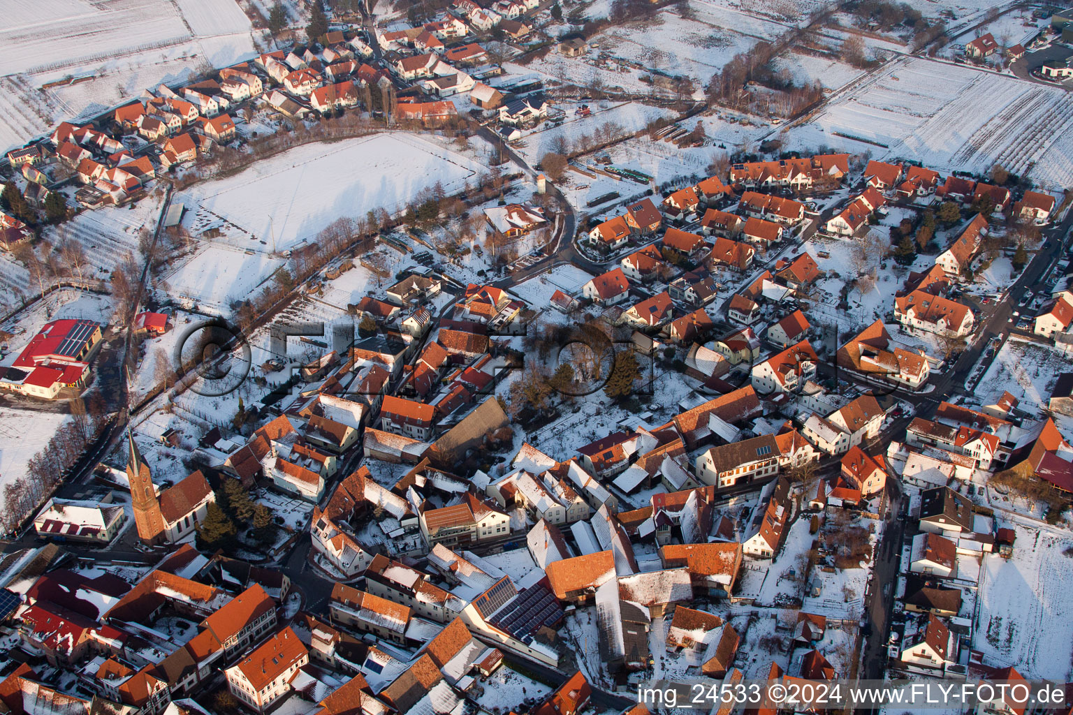 Winter snow covered village view in the district Kapellen in Kapellen-Drusweiler in the state Rhineland-Palatinate, Germany