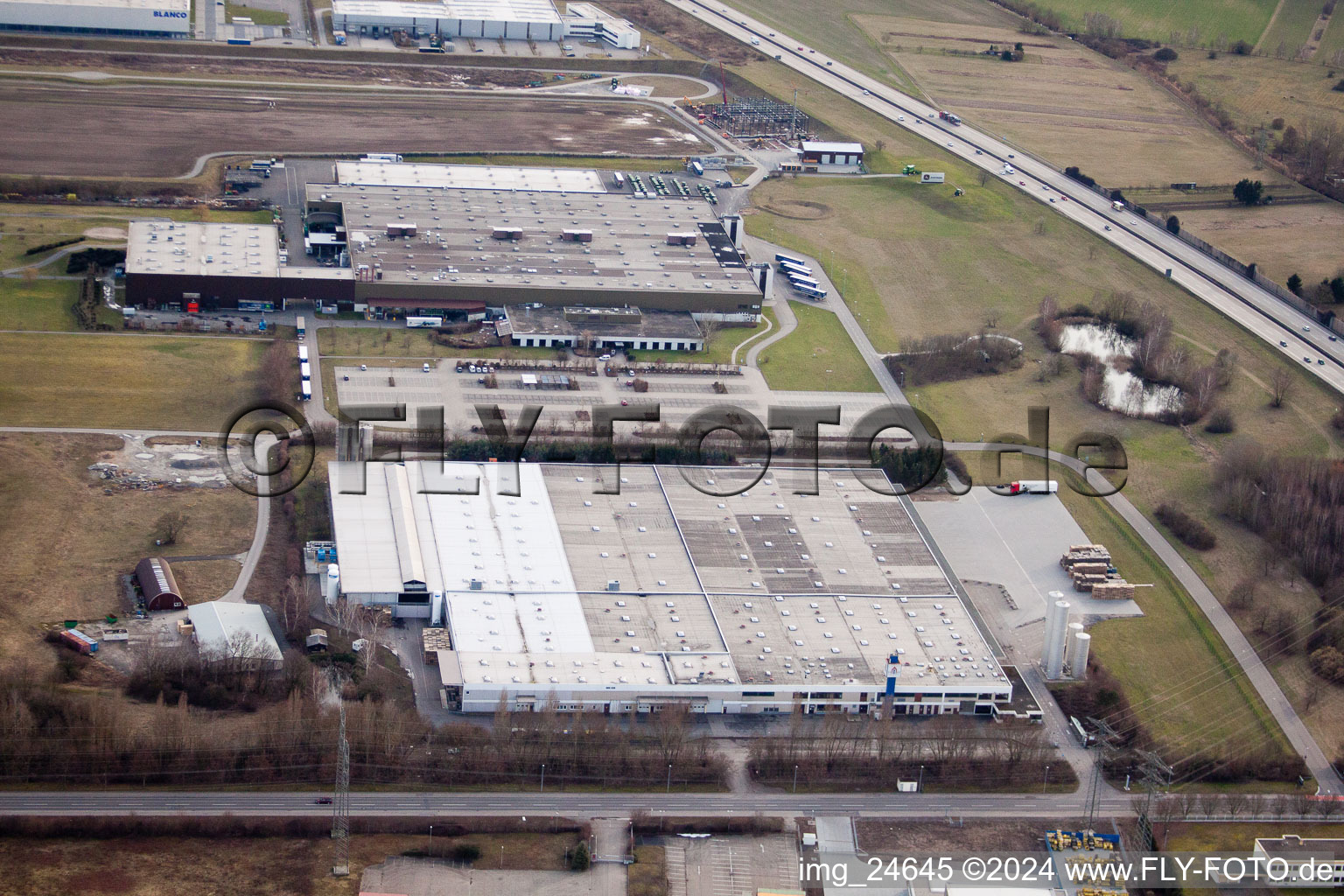 Industrial area on the motorway Refresco Group in Bruchsal in the state Baden-Wuerttemberg, Germany