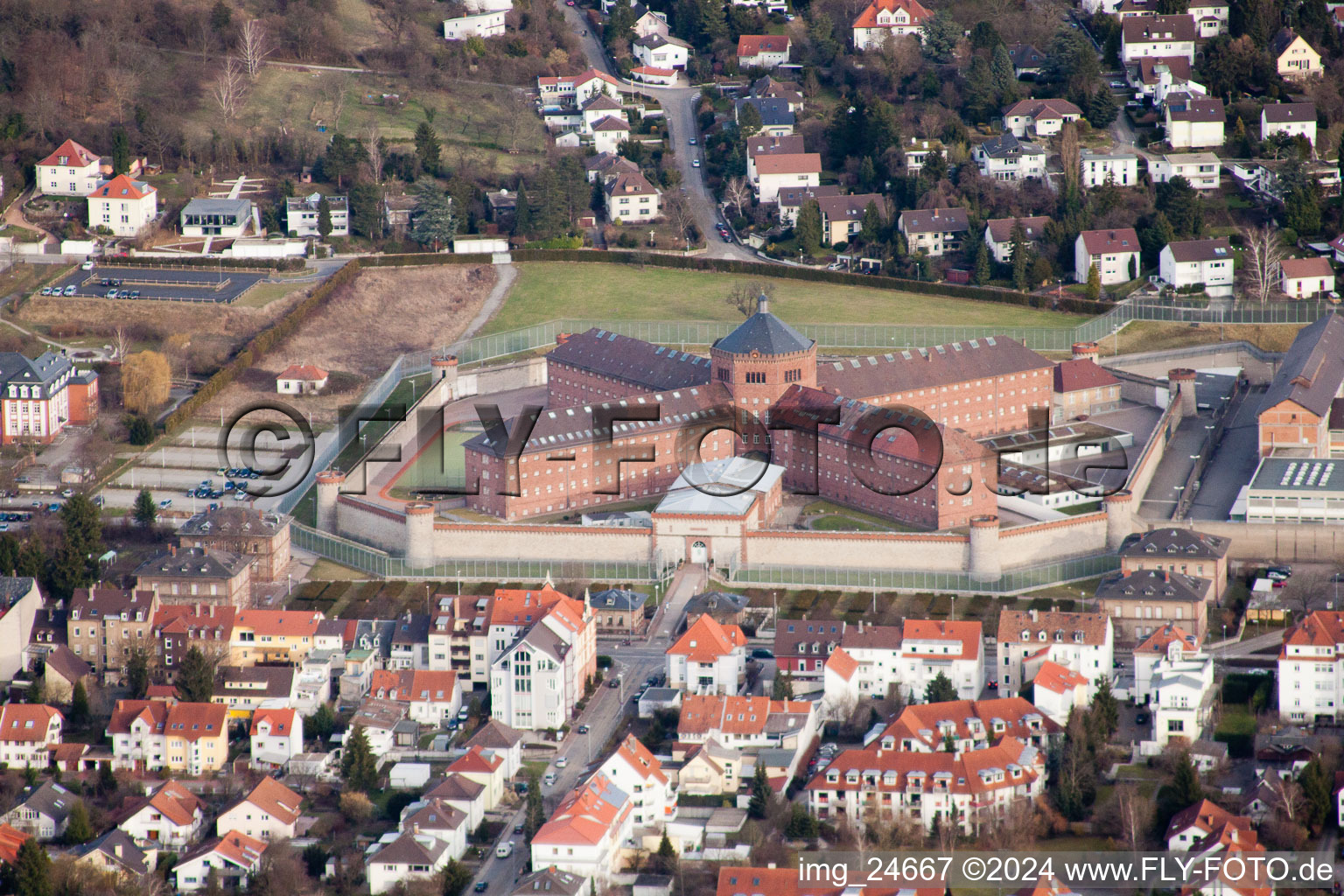 Prison grounds and high security fence Prison Schoenbornstrasse in the district Untergrombach in Bruchsal in the state Baden-Wurttemberg