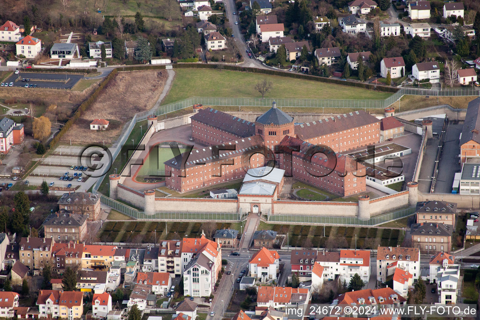 Aerial view of Prison grounds and high security fence Prison Schoenbornstrasse in the district Untergrombach in Bruchsal in the state Baden-Wurttemberg