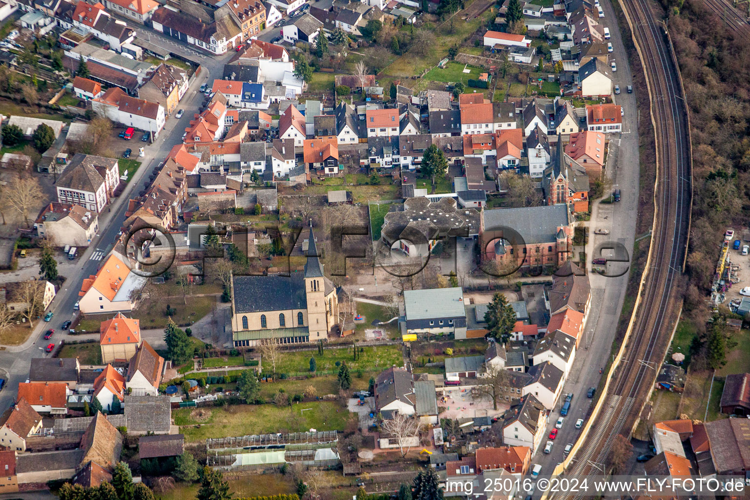 Aerial view of Church building in the village of in the district Friedrichsfeld in Mannheim in the state Baden-Wurttemberg, Germany