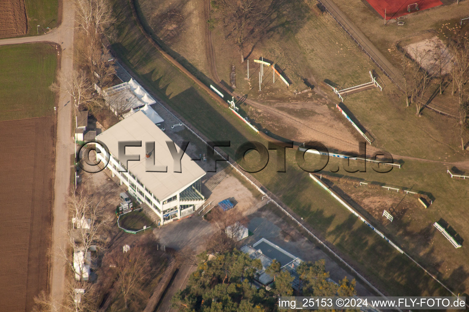 Forest race track of the Baden Racing Club in the district Seckenheim in Mannheim in the state Baden-Wuerttemberg, Germany seen from above