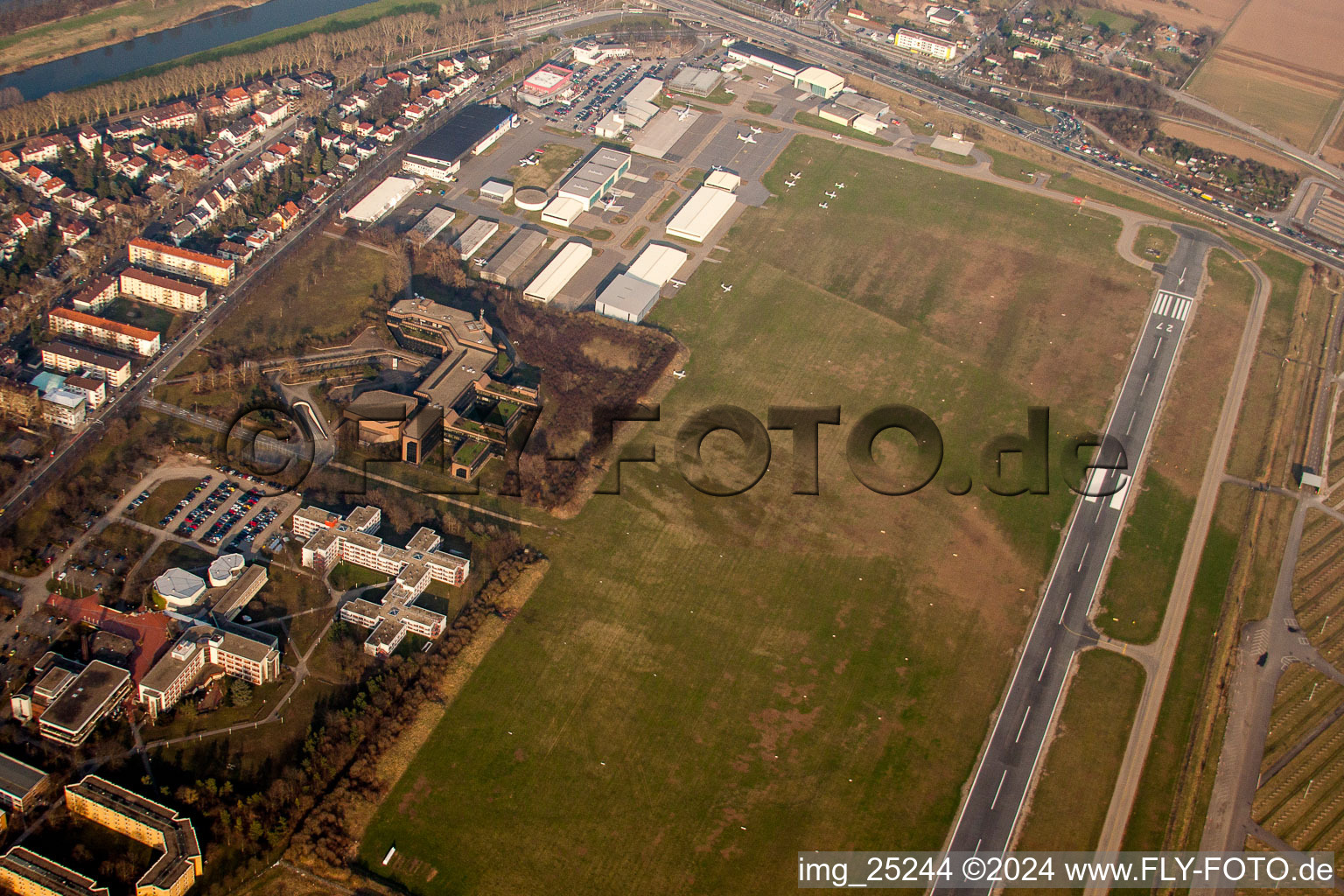 Runway with hangar taxiways and terminals on the grounds of the airport City Airport Mannheim in the district Neuostheim in Mannheim in the state Baden-Wurttemberg, Germany