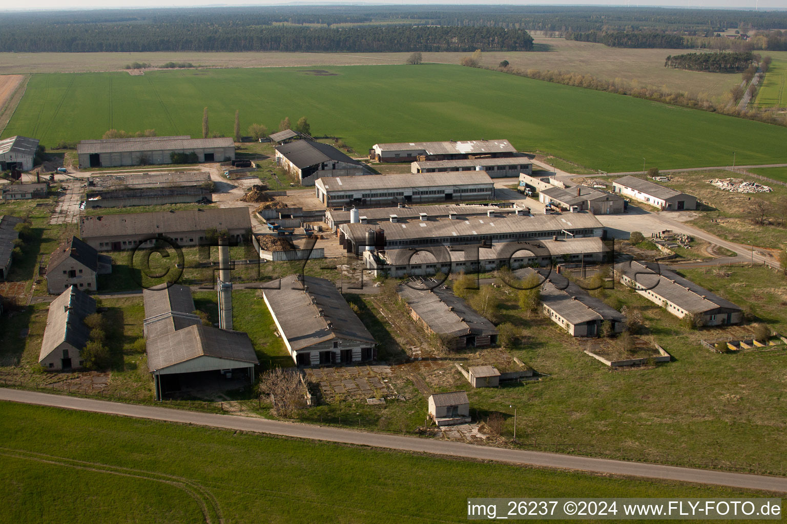 Aerial view of Ruin of abandoned agricultural function building in the district Ahlsdorf in Schoenewalde in the state Brandenburg