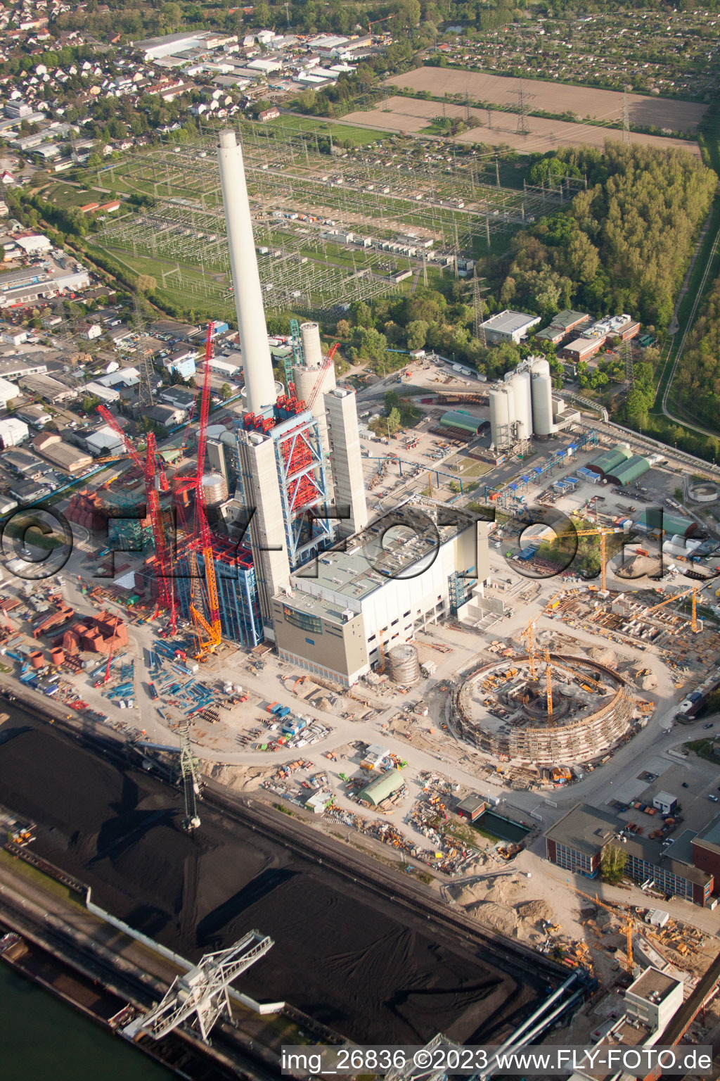 Aerial view of EnBW building new coal-fired power plant on the Rhine in the district Rheinhafen in Karlsruhe in the state Baden-Wuerttemberg, Germany
