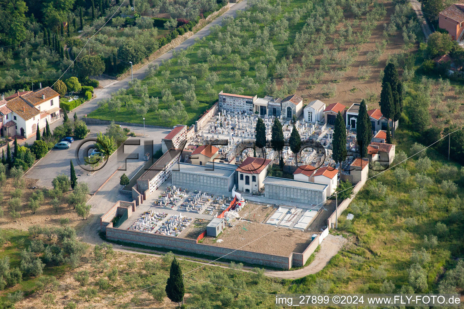 Grave rows on the grounds of the cemetery Lignano in Arezzo in Toscana, Italy