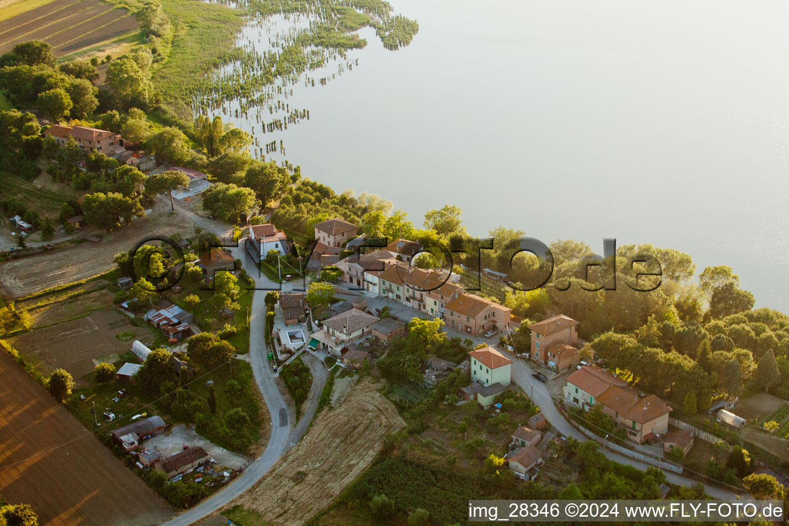 Village on the lake bank areas of the Lago di Montepulciano in Mugnanesi in Umbria, Italy