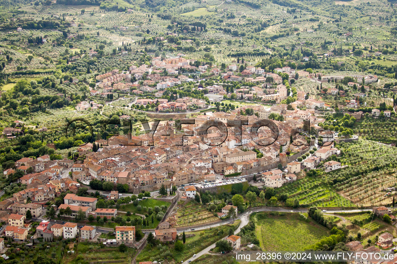 Village - view on the edge of agricultural fields and farmland in Monte San Savino in Toskana, Italy