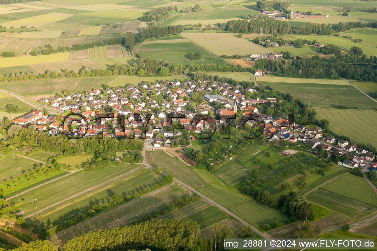 Village - view on the edge of agricultural fields and farmland in the district Honau in Rheinau in the state Baden-Wurttemberg, Germany