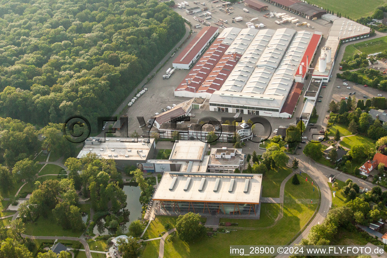 Oblique view of Building and production halls on the premises of WeberHaus GmbH & Co. KG in the district Linx in Rheinau in the state Baden-Wurttemberg, Germany
