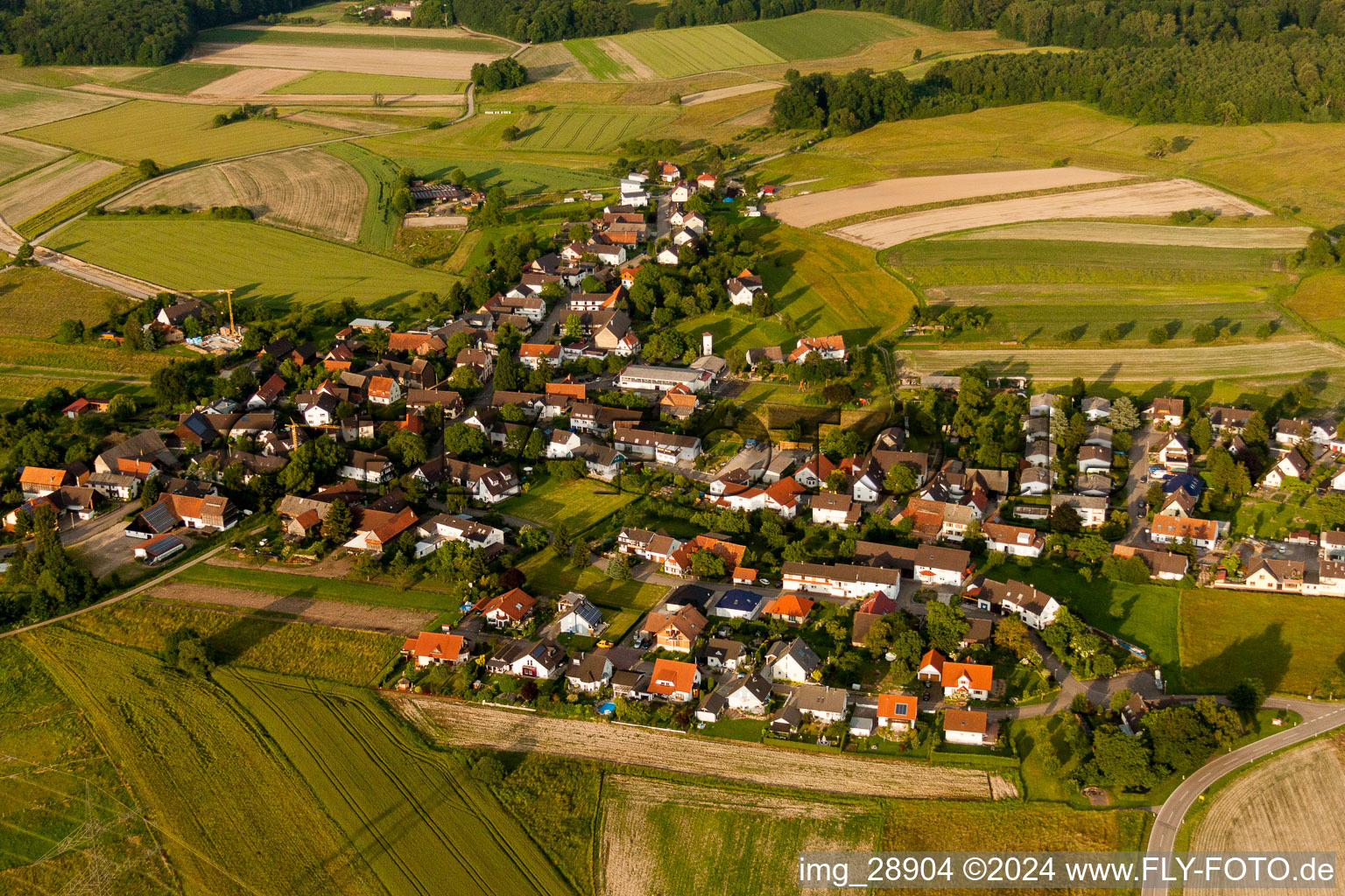 Village - view on the edge of agricultural fields and farmland in Zierolshofen in the state Baden-Wurttemberg, Germany