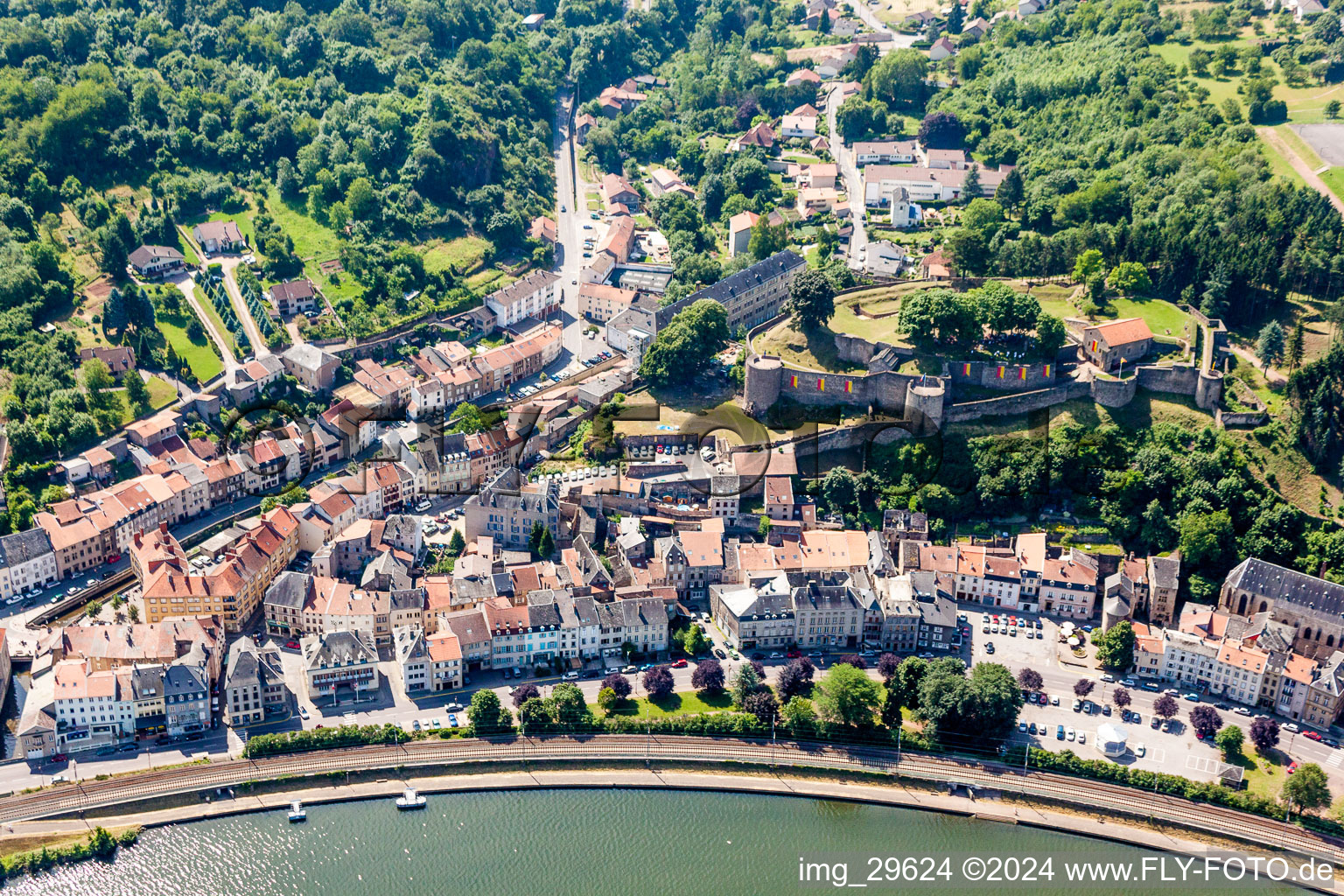 Aerial photograpy of Village on the river bank areas of the river Mosel in Sierck-les-Bains in Grand Est, France