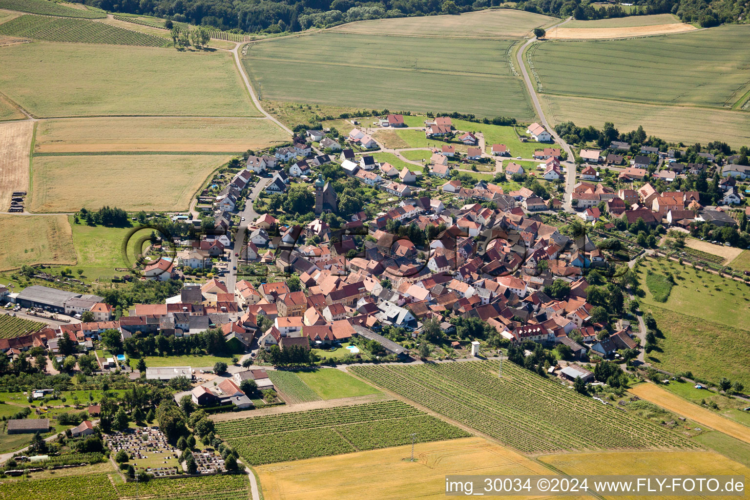 Village - view on the edge of agricultural fields and farmland in the district Neudorferhof in Duchroth in the state Rhineland-Palatinate