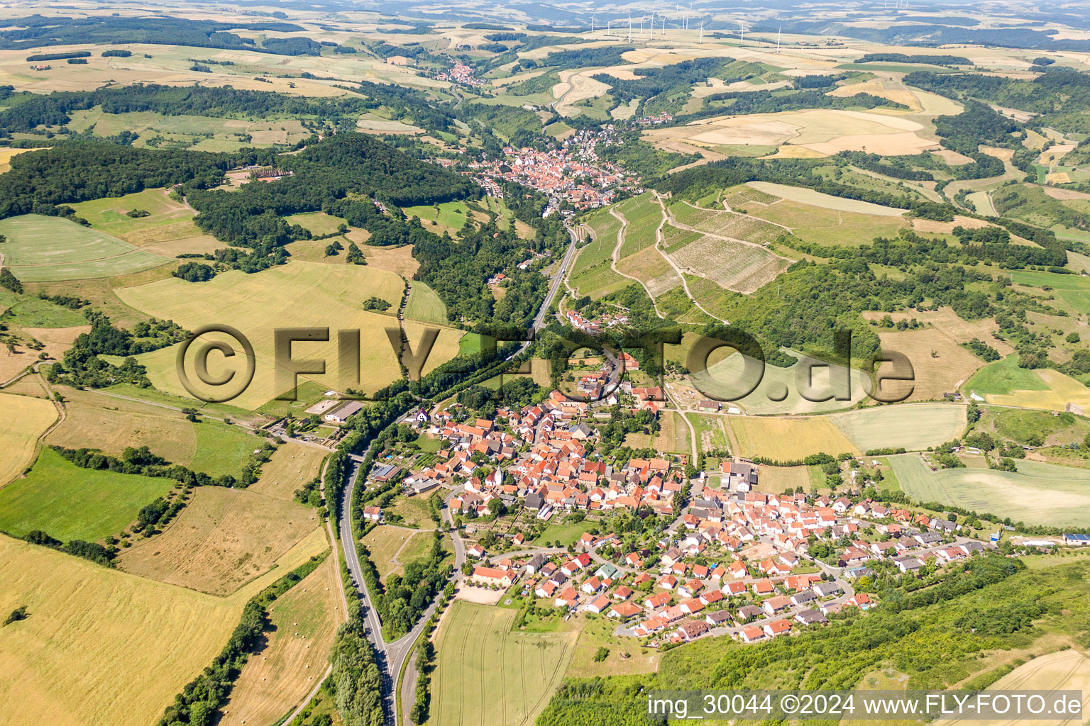 Village - view on the edge of agricultural fields and farmland in Alsenz in the state Rhineland-Palatinate, Germany