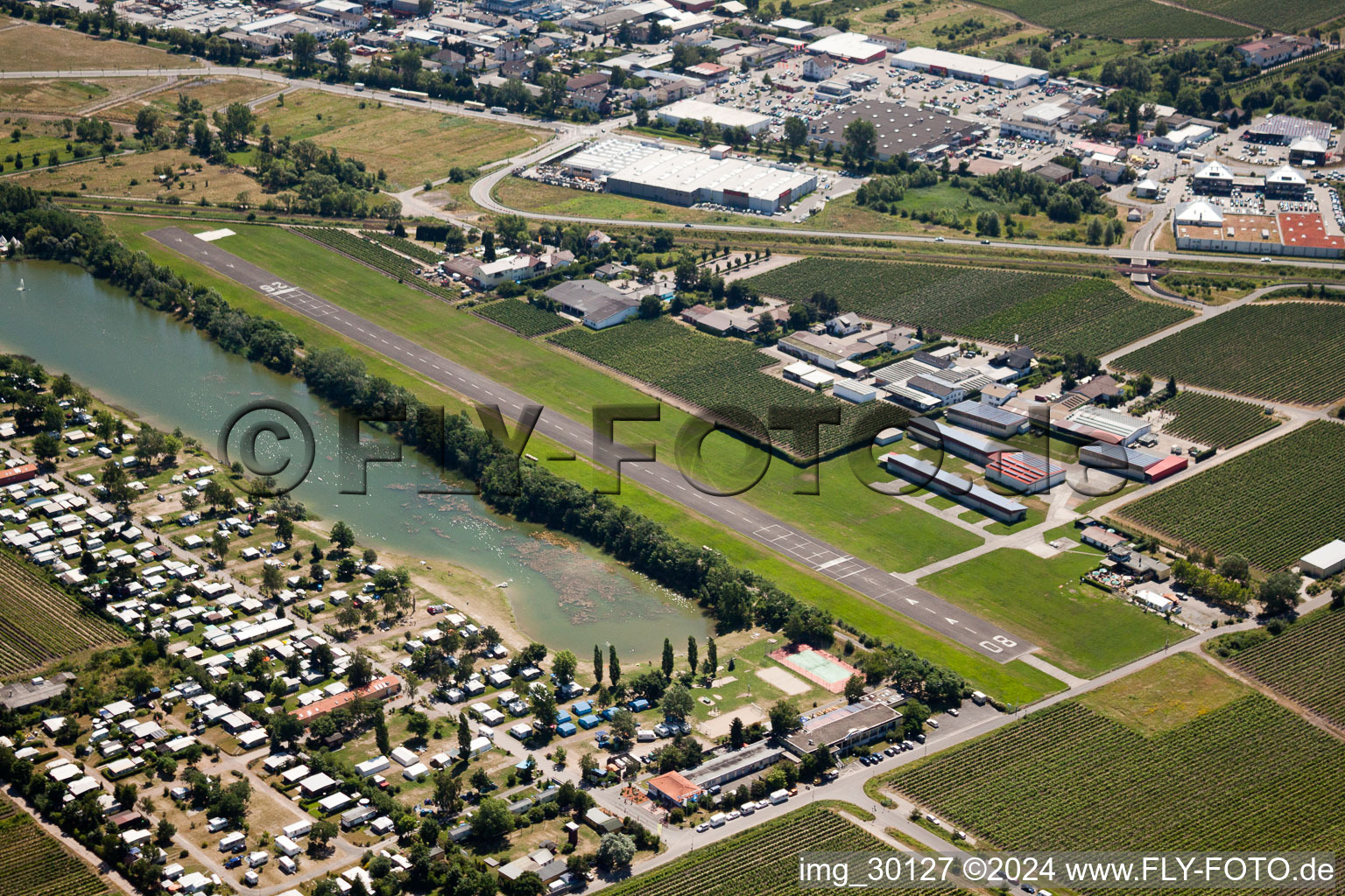 Runway with tarmac terrain of airfield Flugplatz Bad Duerkheim in Bad Duerkheim in the state Rhineland-Palatinate