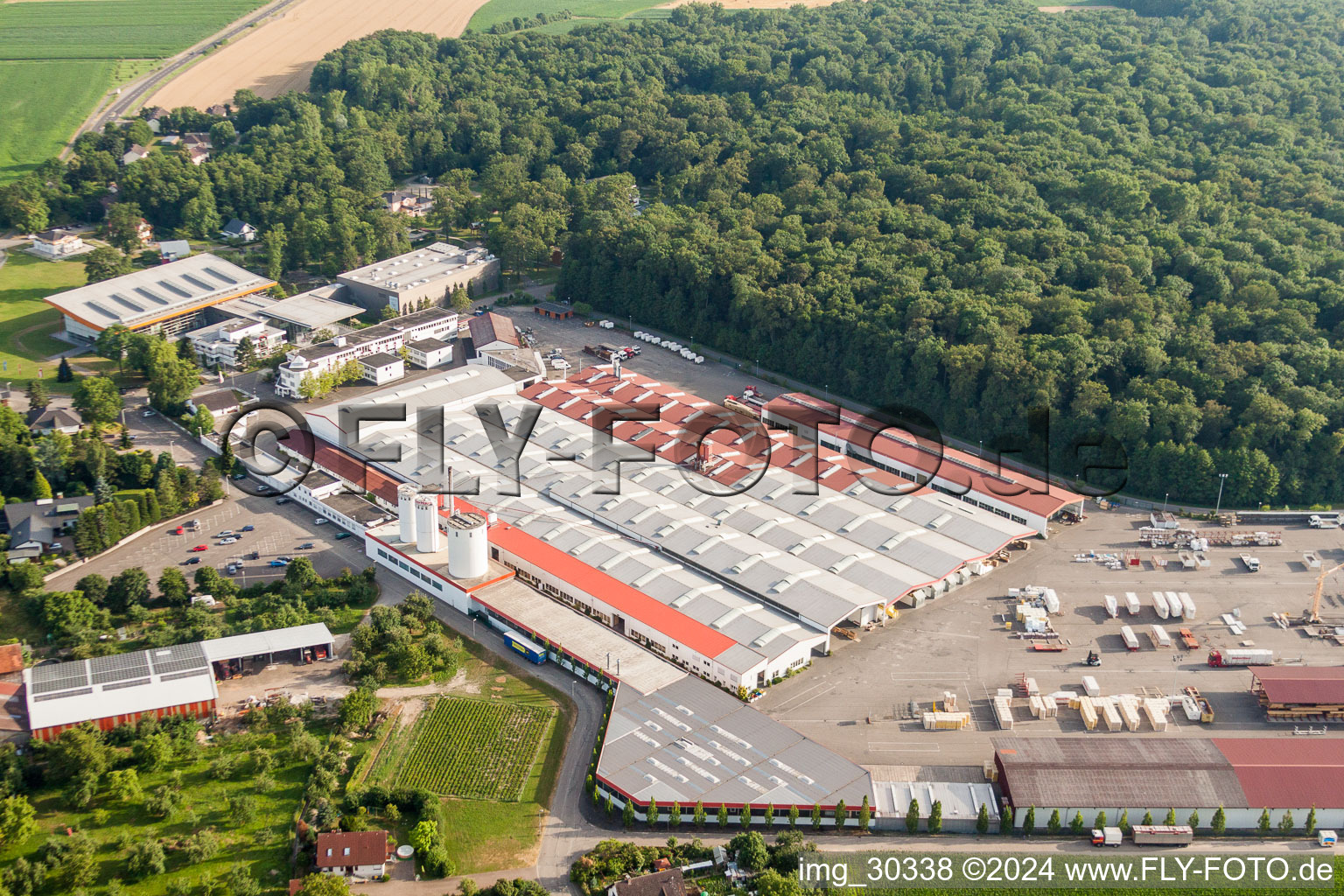 Building and production halls on the premises of WeberHaus GmbH & Co. KG in the district Linx in Rheinau in the state Baden-Wurttemberg, Germany seen from above