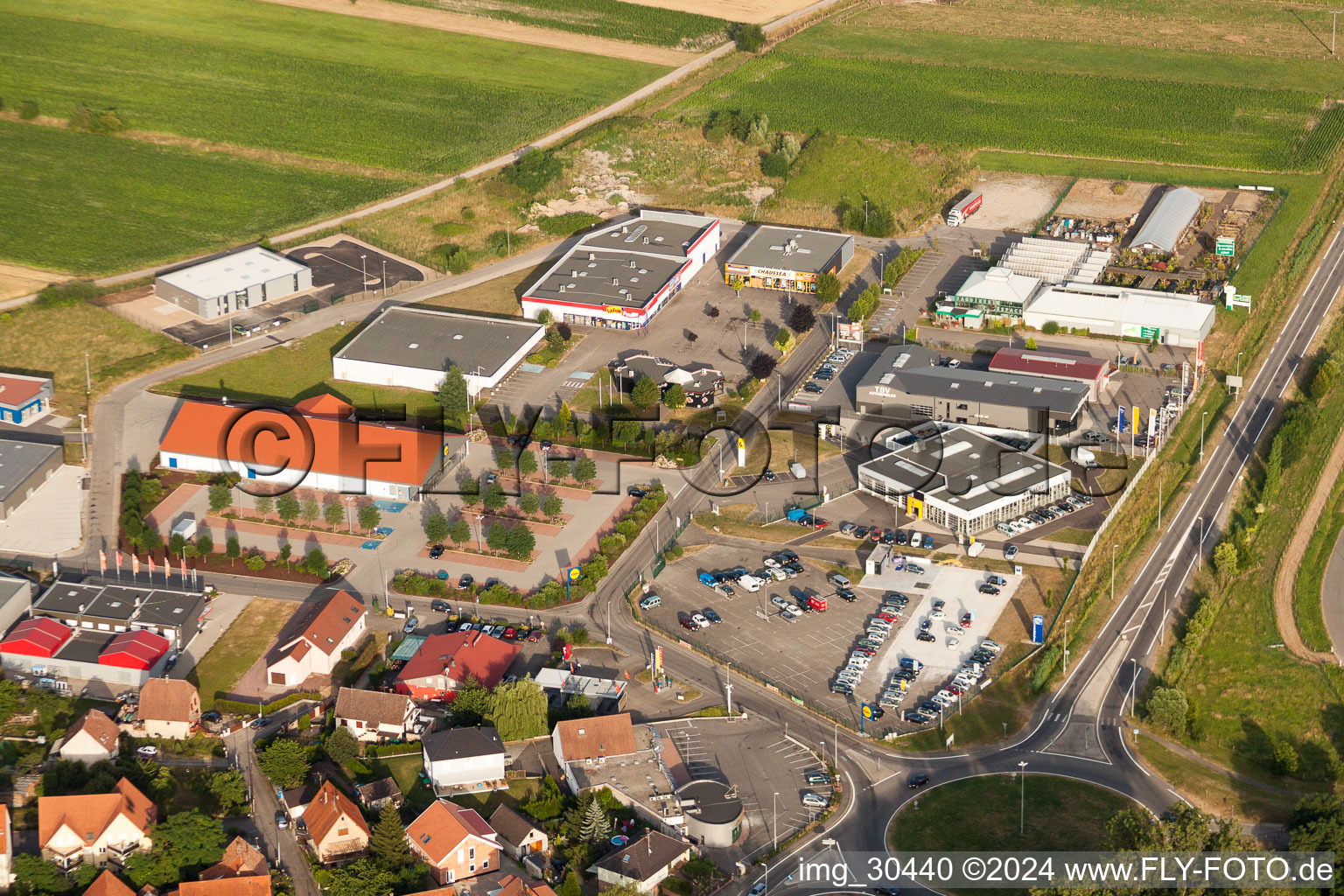 Aerial view of Industrial estate and company settlement rue of Champs in Oberhoffen-sur-Moder in Grand Est, France