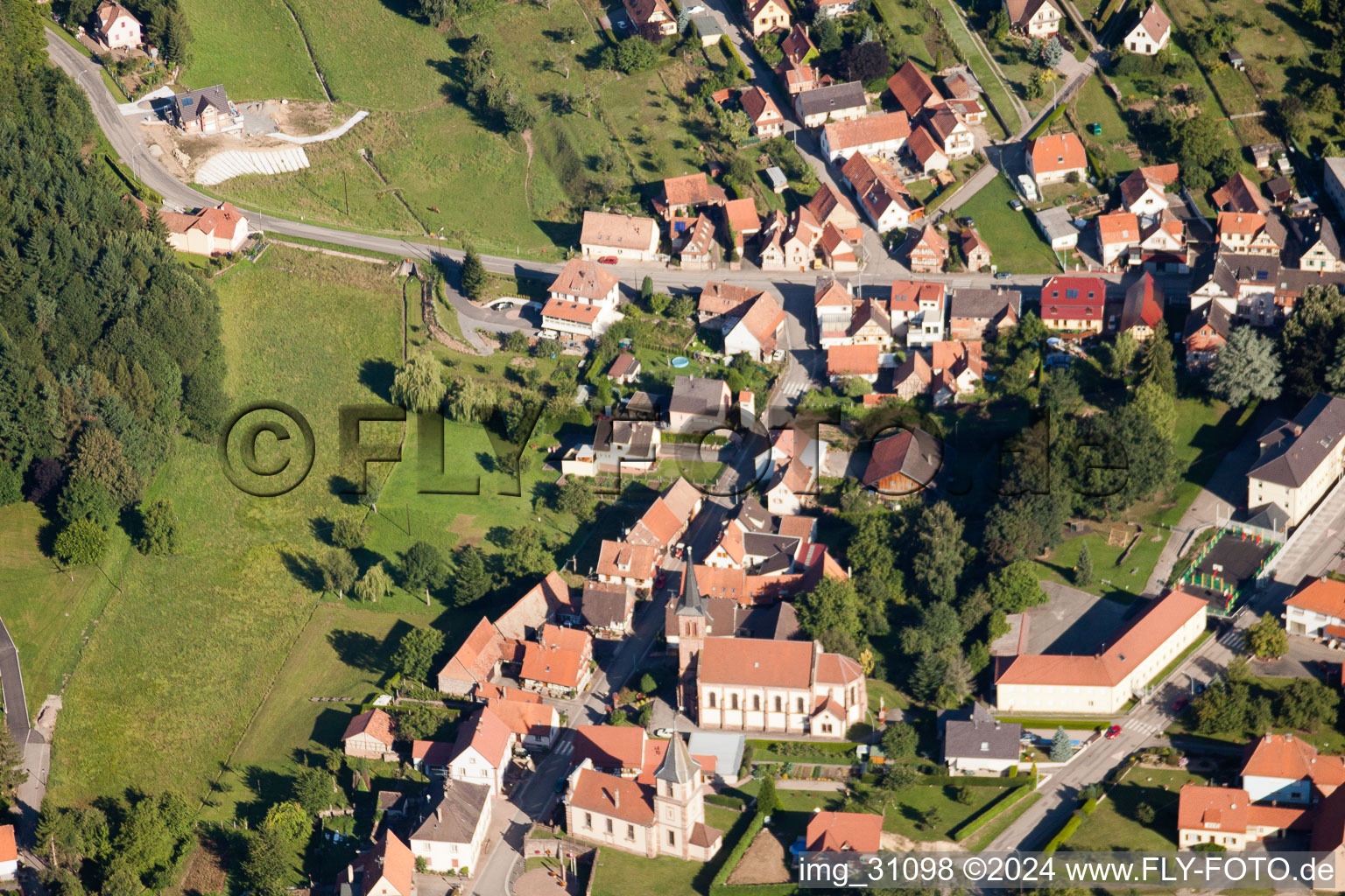 Aerial view of Two Church buildings in the village of in Climbach in Grand Est, France