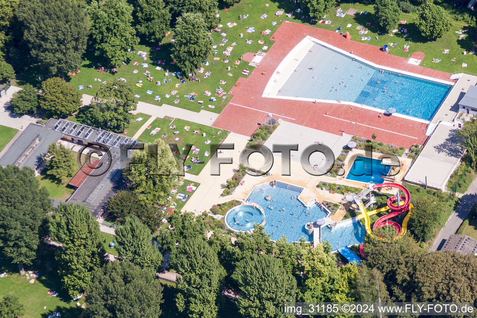 Aerial view of Bathers on the lawn by the pool of the swimming pool Rheinstrandbad Rappenwoert in the district Daxlanden in Karlsruhe in the state Baden-Wurttemberg, Germany