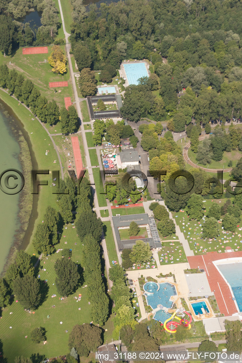 Aerial photograpy of Bathers on the lawn by the pool of the swimming pool Rheinstrandbad Rappenwoert in the district Daxlanden in Karlsruhe in the state Baden-Wurttemberg, Germany