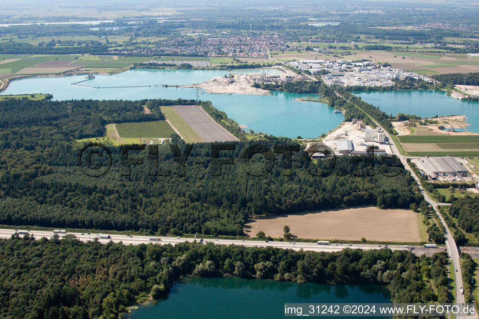 Quarry ponds from the east in Iffezheim in the state Baden-Wuerttemberg, Germany