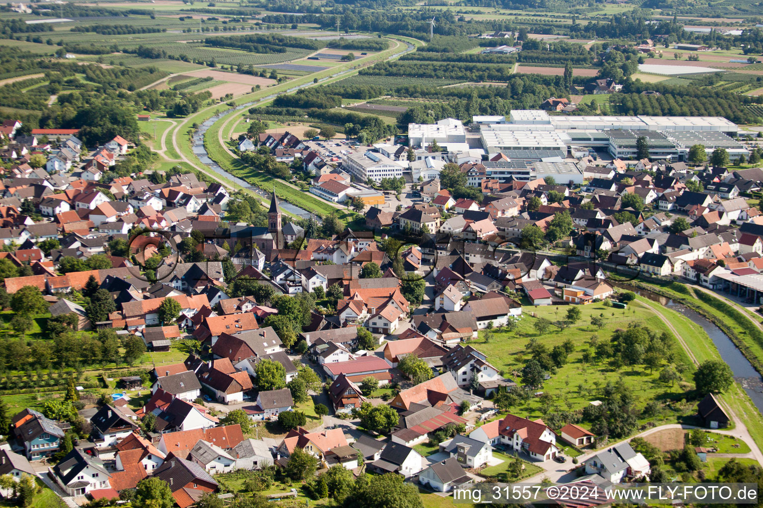 Aerial view of Village on the river bank areas of the river Rench in the district Erlach in Renchen in the state Baden-Wurttemberg