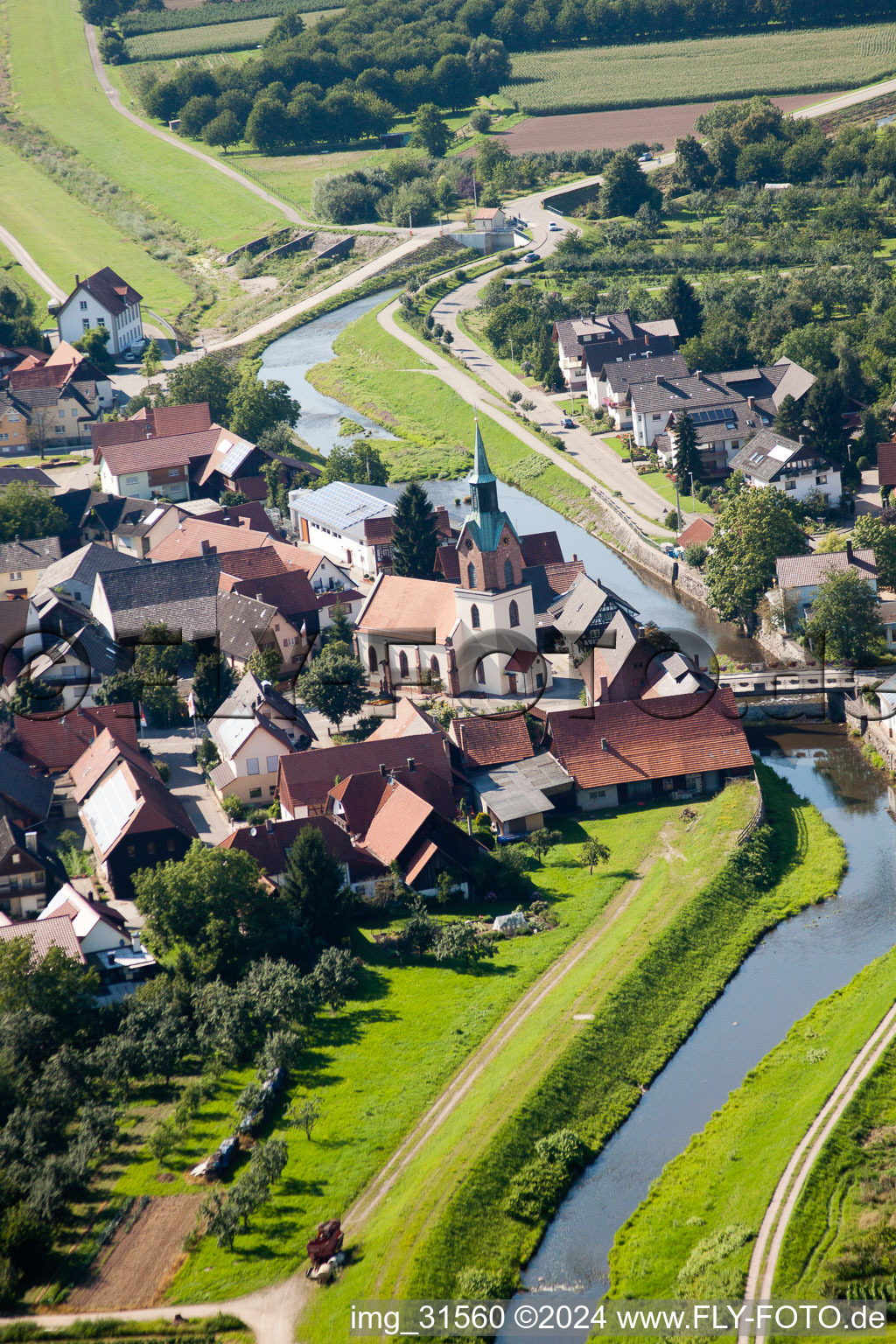 Oblique view of Village on the river bank areas of the river Rench in the district Erlach in Renchen in the state Baden-Wurttemberg