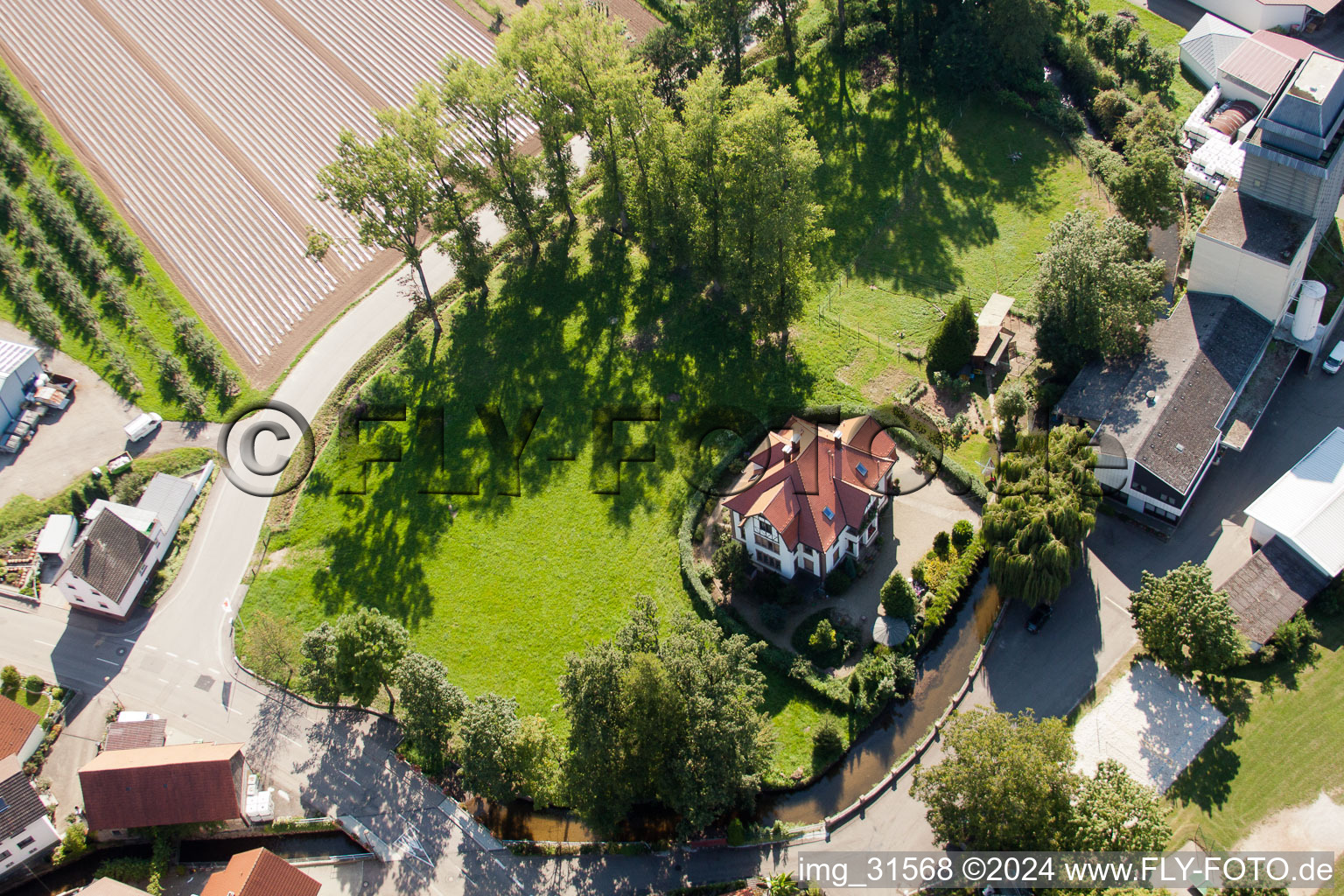 Aerial view of Villa am Mühlbach. Theodor Walz Art and Customer Mill in the district Erlach in Renchen in the state Baden-Wuerttemberg, Germany