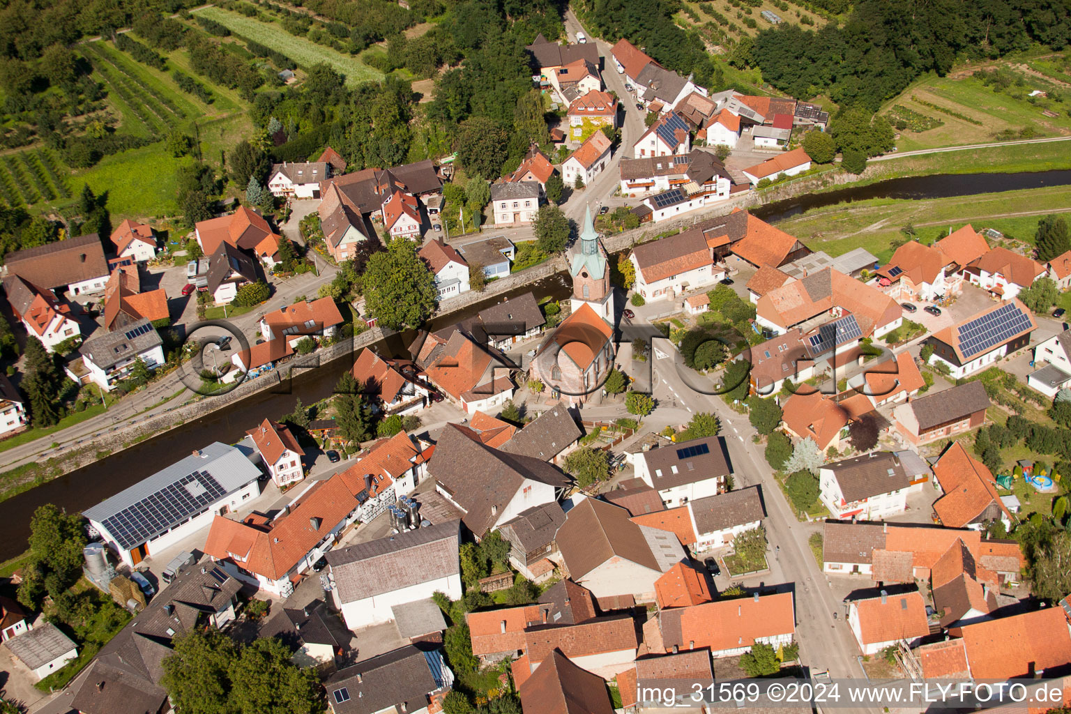 Village on the river bank areas of the river Rench in the district Erlach in Renchen in the state Baden-Wurttemberg from above