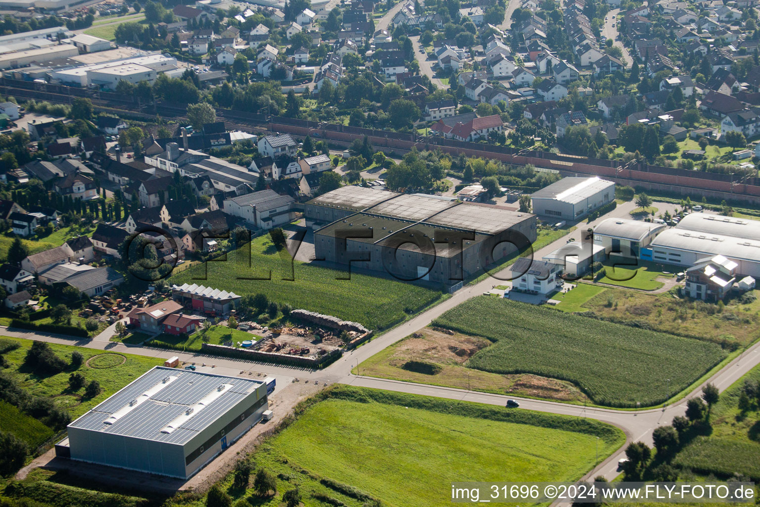Oblique view of Building and production halls on the premises of Muffenrohr GmbH in Ottersweier in the state Baden-Wurttemberg