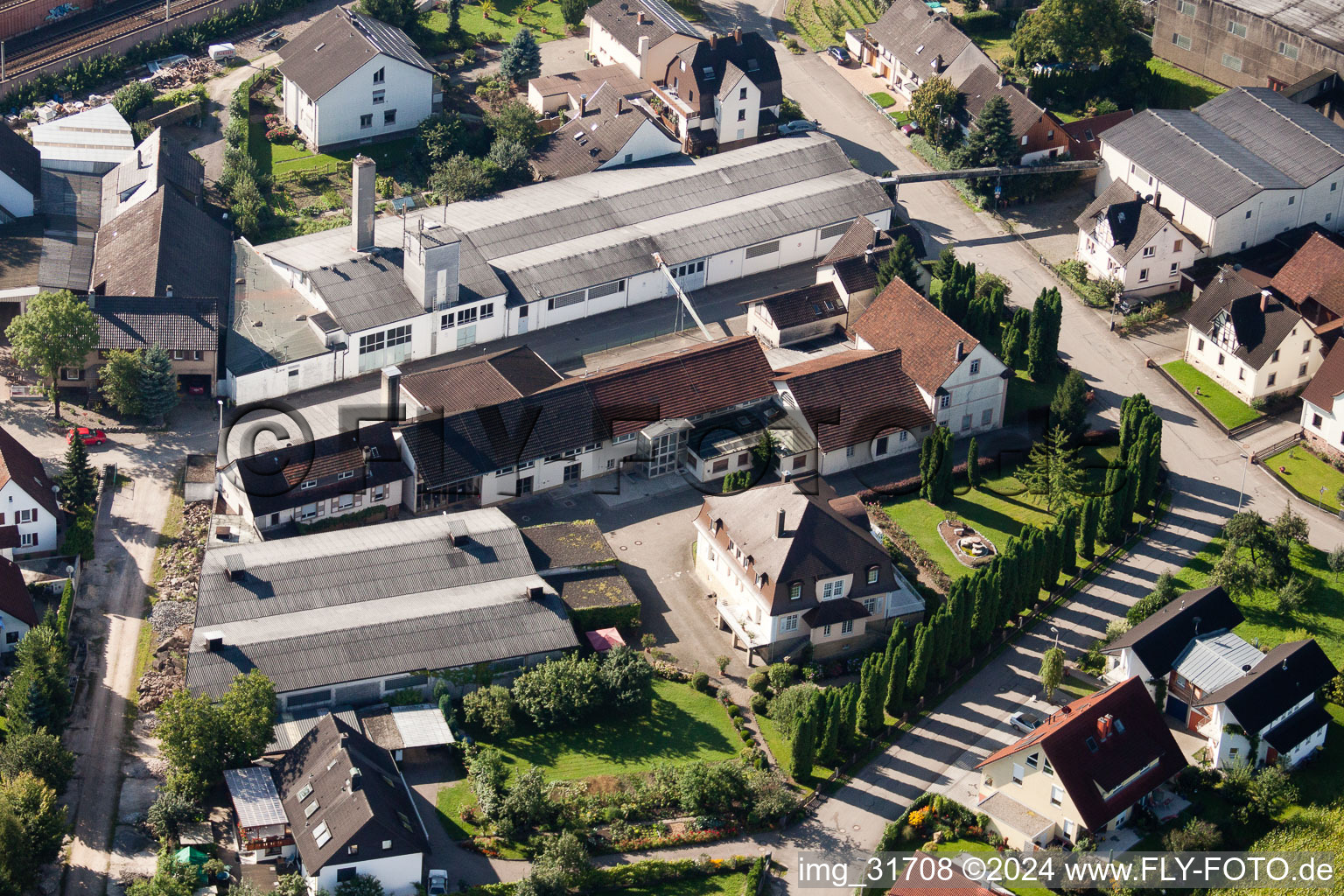 Building and production halls on the premises of Muffenrohr GmbH in Ottersweier in the state Baden-Wurttemberg seen from a drone