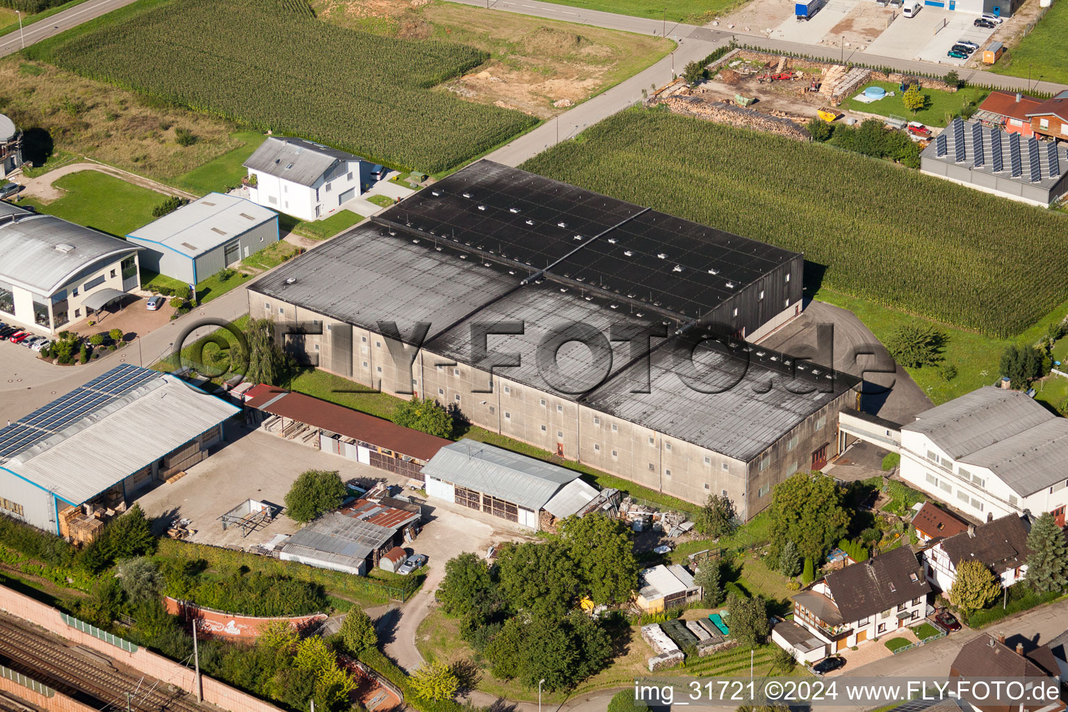 Building and production halls on the premises of Muffenrohr GmbH in Ottersweier in the state Baden-Wurttemberg from the plane