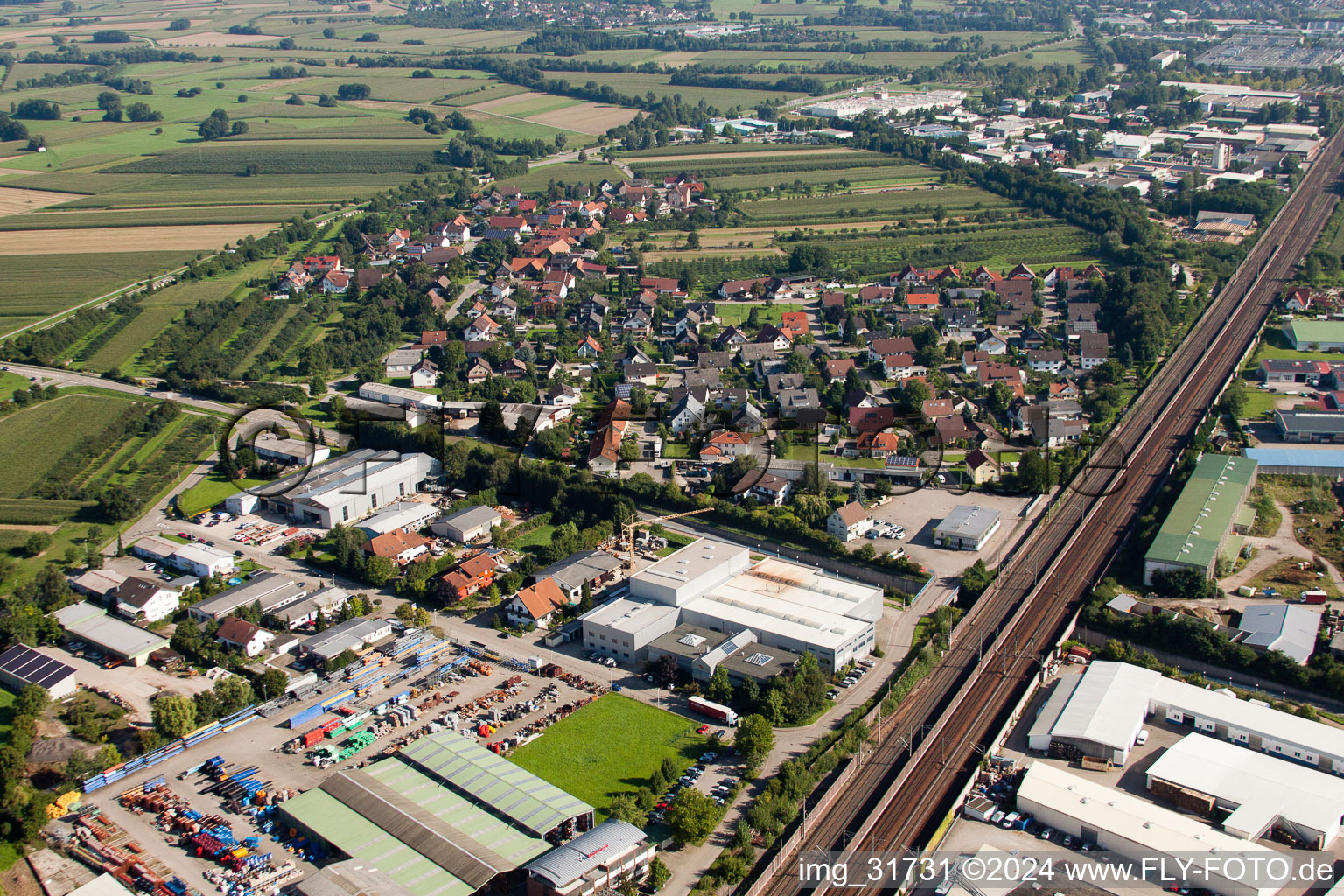 Building and production halls on the premises of Muffenrohr GmbH in Ottersweier in the state Baden-Wurttemberg from a drone