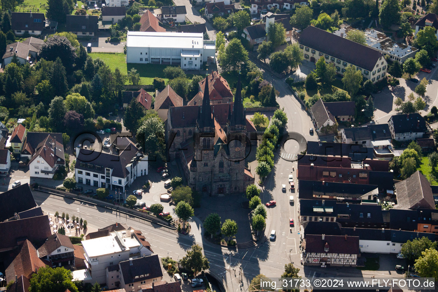 Aerial view of Church building Katholische Pfarrkirche St. Johannes in Ottersweier in the state Baden-Wurttemberg, Germany