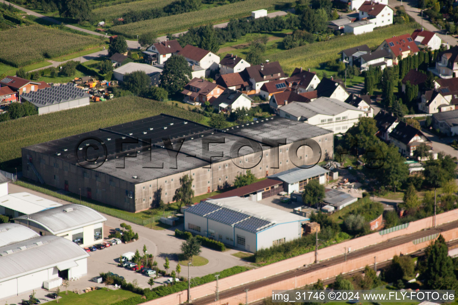 Building and production halls on the premises of Muffenrohr GmbH in Ottersweier in the state Baden-Wurttemberg seen from a drone