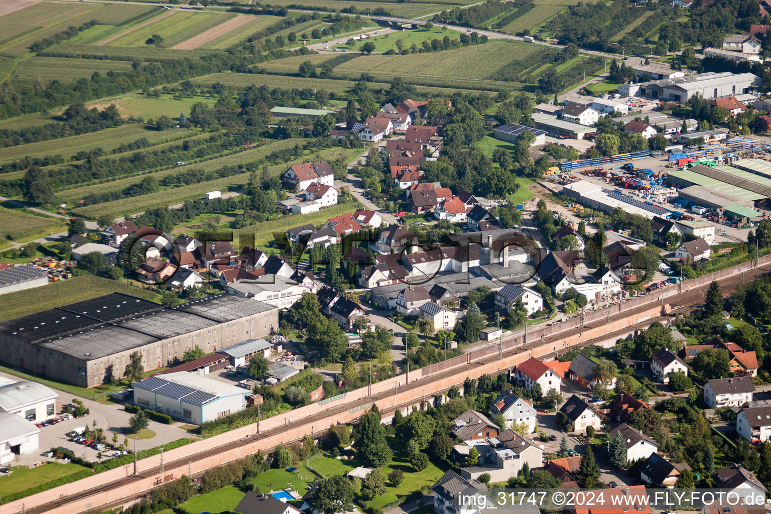 Oblique view of Building and production halls on the premises of Muffenrohr GmbH in Ottersweier in the state Baden-Wurttemberg