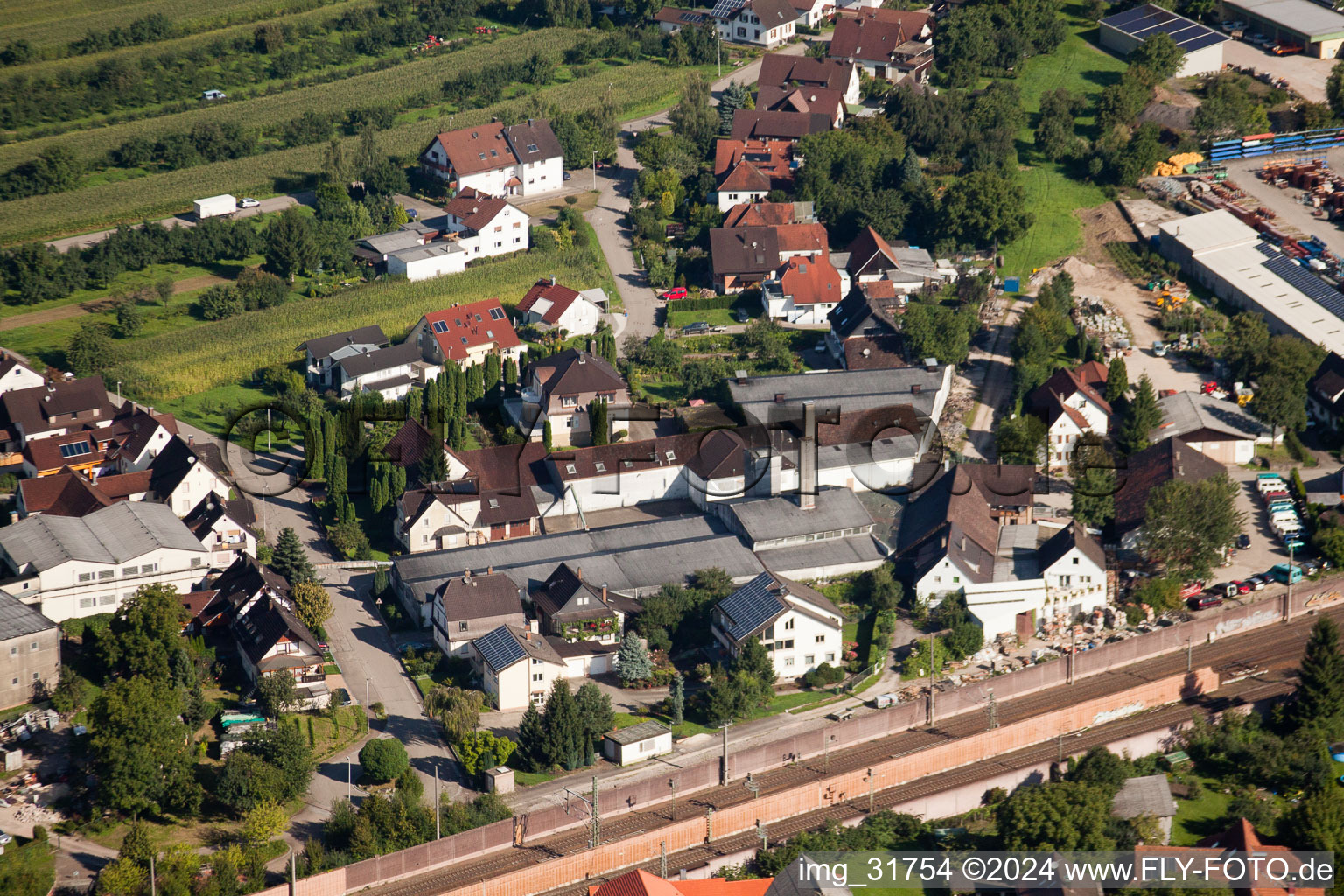 Building and production halls on the premises of Muffenrohr GmbH in Ottersweier in the state Baden-Wurttemberg seen from above