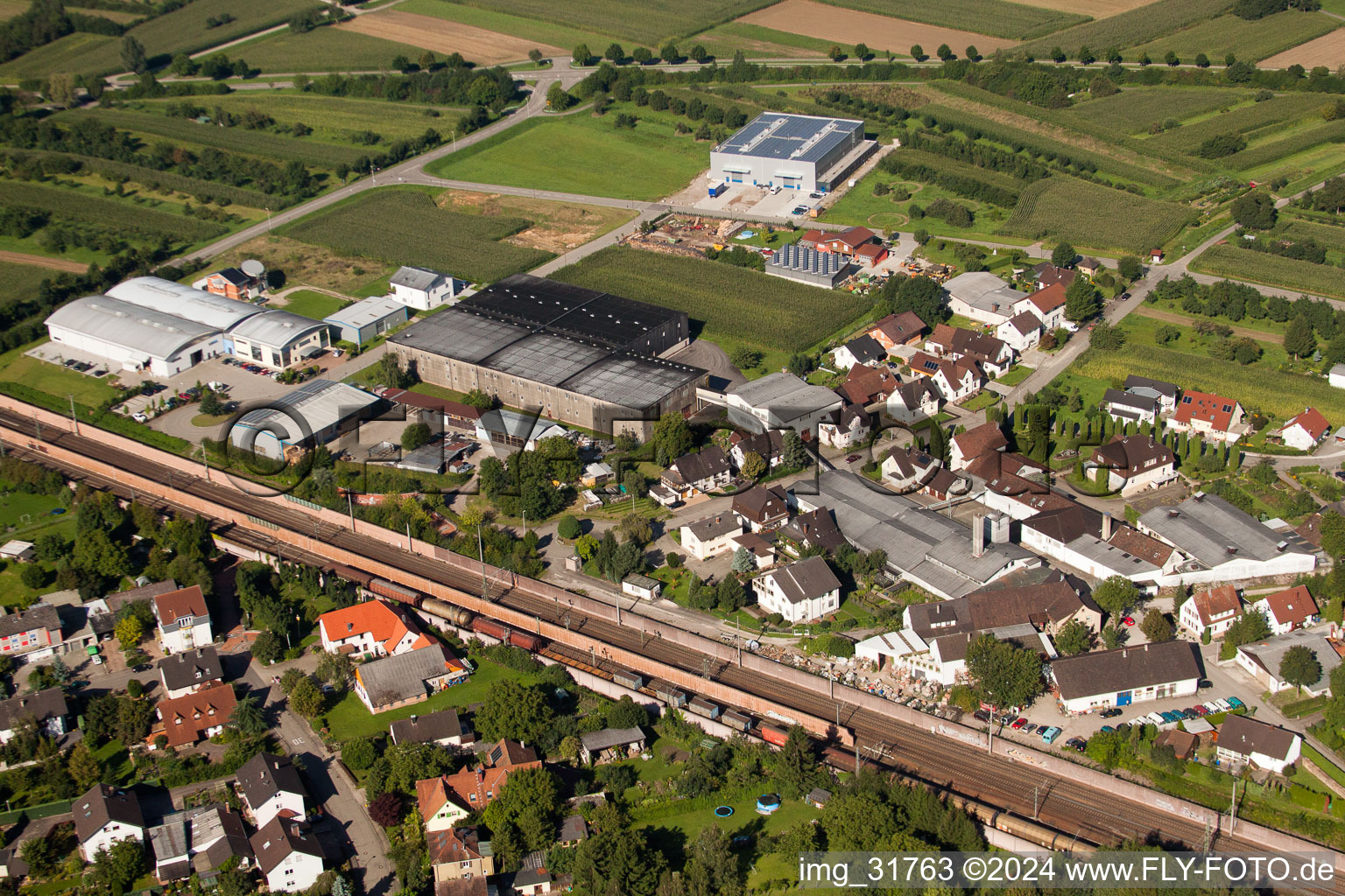 Building and production halls on the premises of Muffenrohr GmbH in Ottersweier in the state Baden-Wurttemberg viewn from the air