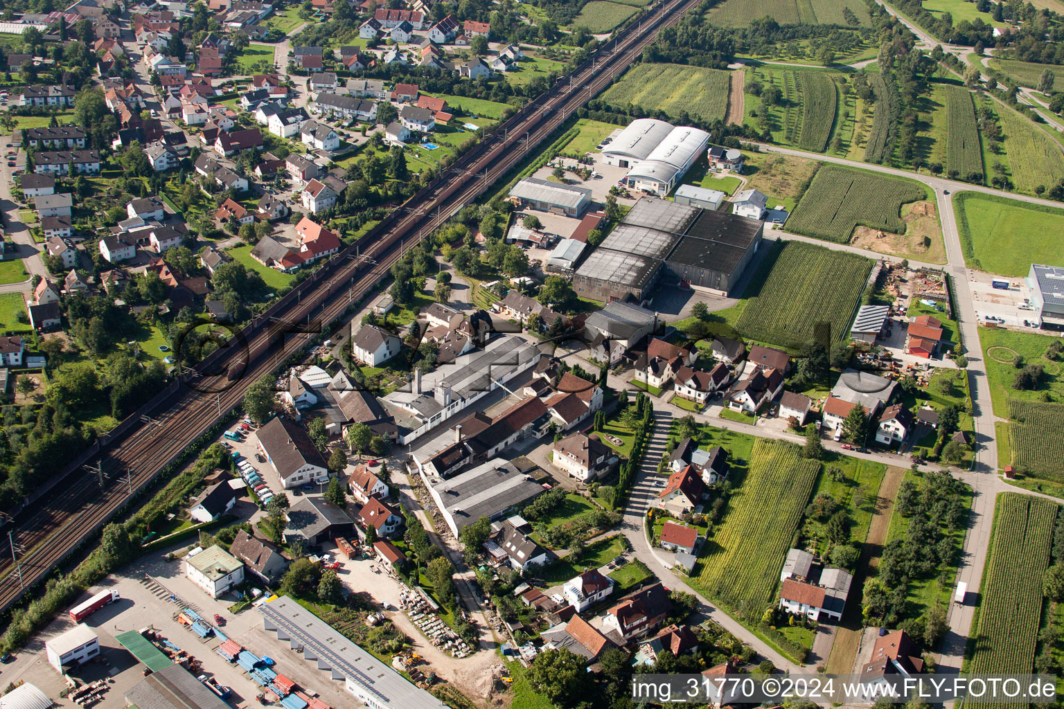 Building and production halls on the premises of Muffenrohr GmbH in Ottersweier in the state Baden-Wurttemberg seen from a drone