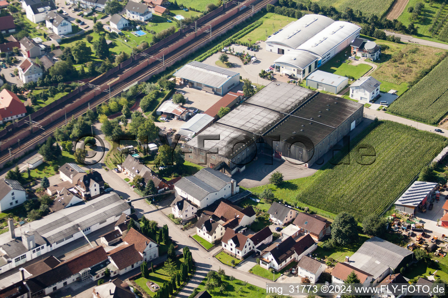 Building and production halls on the premises of Muffenrohr GmbH in Ottersweier in the state Baden-Wurttemberg from a drone