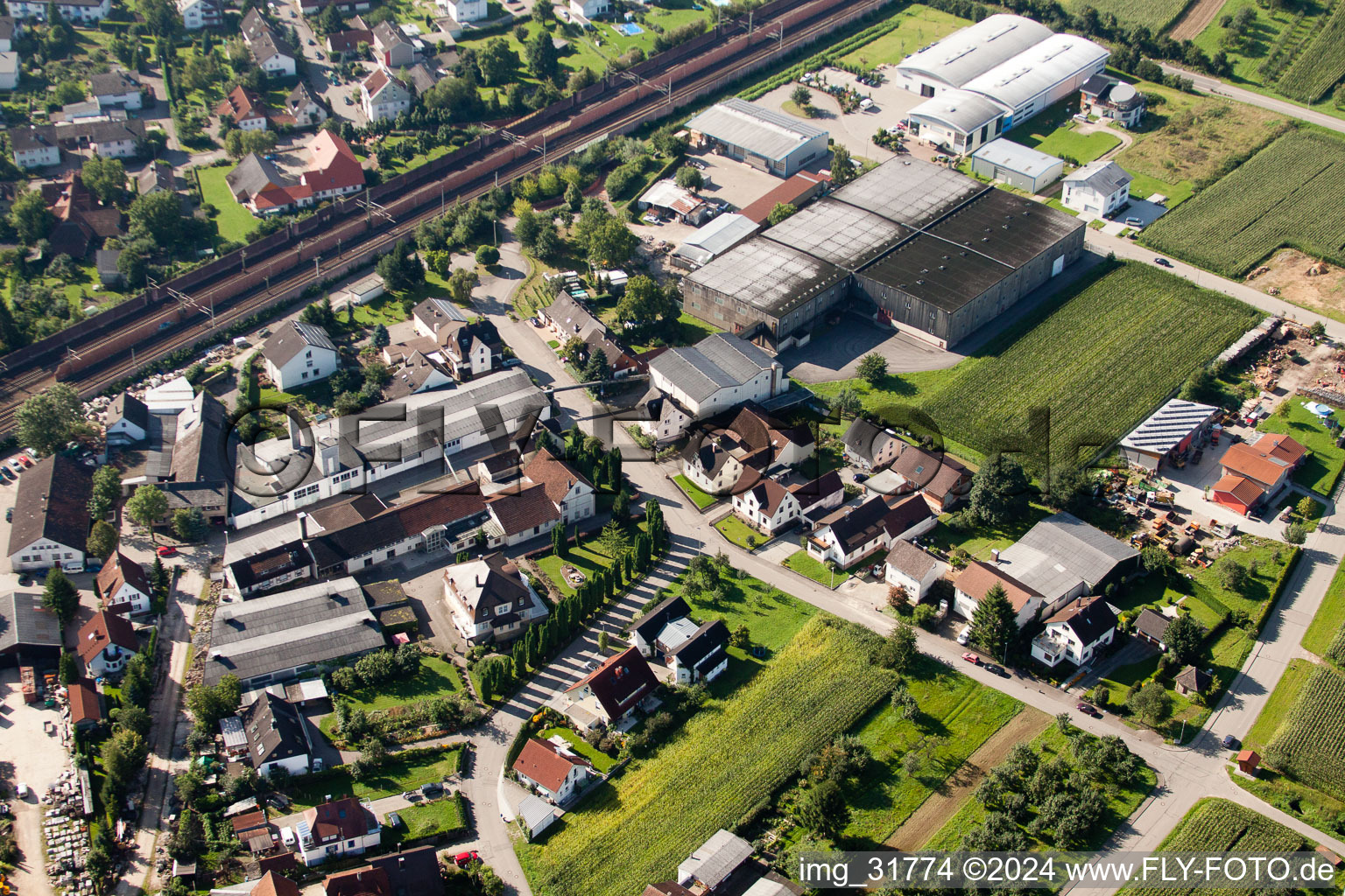 Building and production halls on the premises of Muffenrohr GmbH in Ottersweier in the state Baden-Wurttemberg seen from a drone