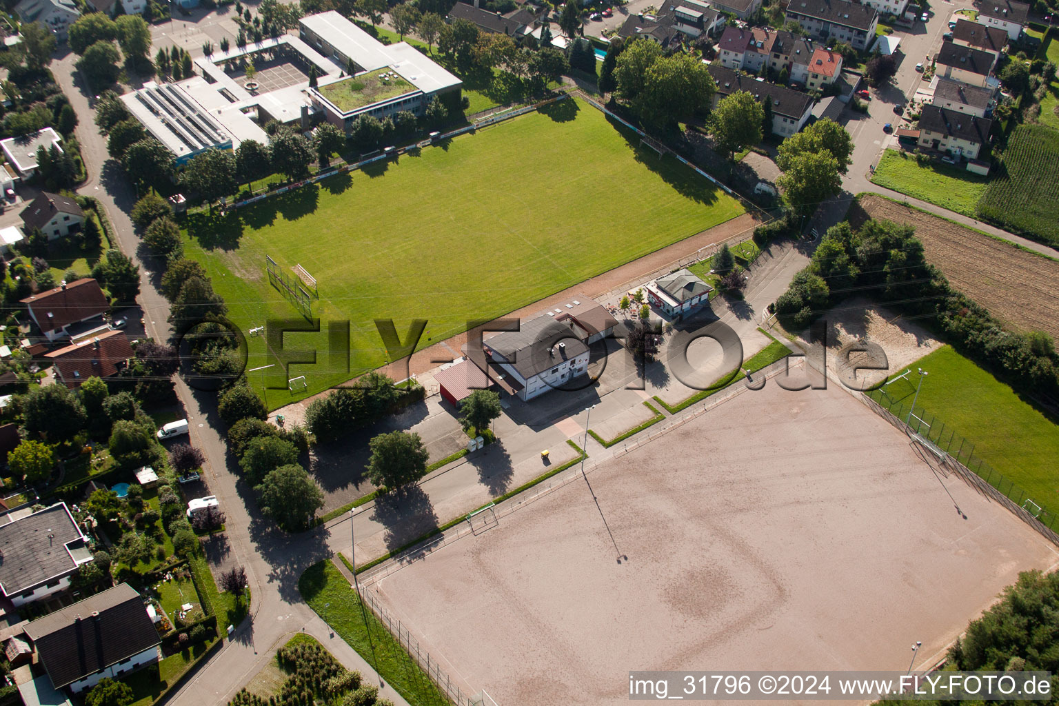 Oblique view of Football field in the district Vimbuch in Bühl in the state Baden-Wuerttemberg, Germany