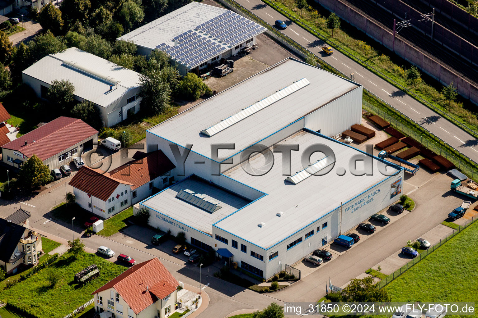 Building of the wholesale center Fachmarkt Rauch with Deutsche Post Filiale 558 in Sinzheim in the state Baden-Wurttemberg, Germany