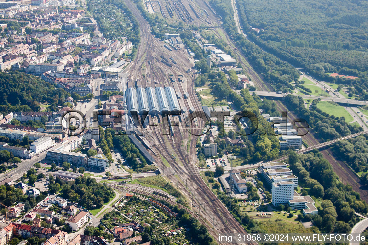 Track progress and building of the main station of the railway in Karlsruhe in the state Baden-Wurttemberg from above