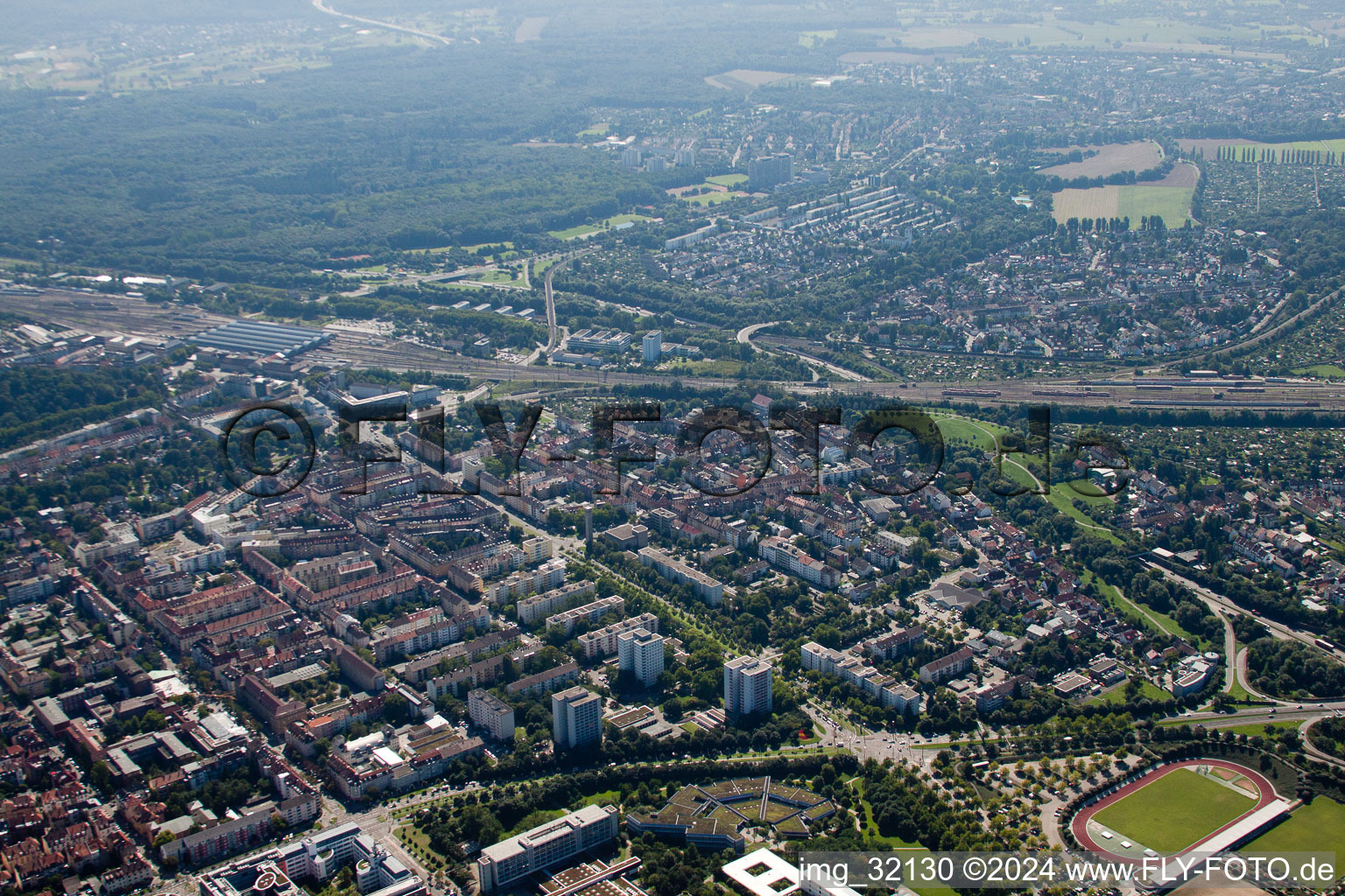 Track progress and building of the main station of the railway in Karlsruhe in the state Baden-Wurttemberg viewn from the air