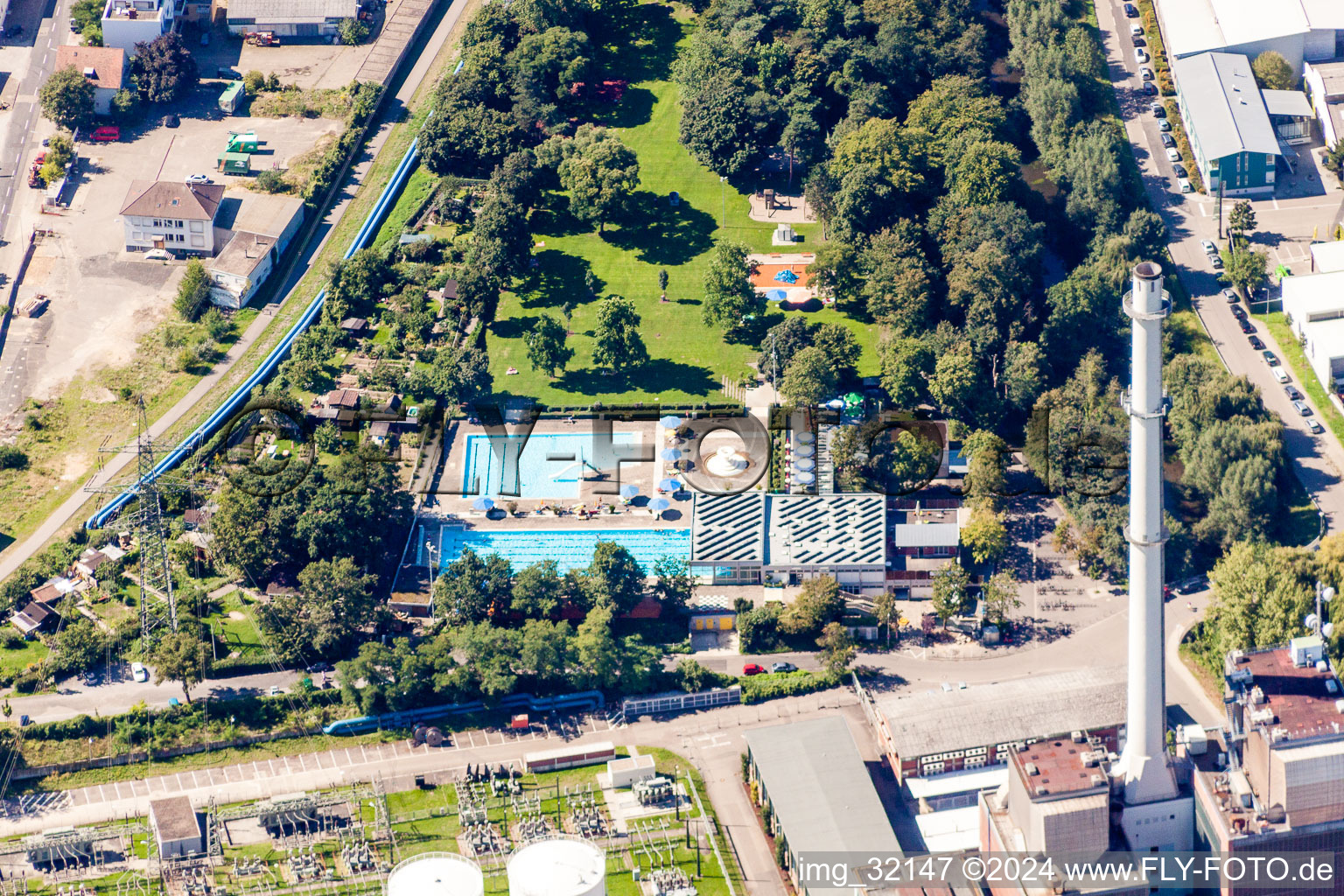 Sunbathing at the West Combined Heat and Power Plant in the district Mühlburg in Karlsruhe in the state Baden-Wuerttemberg, Germany