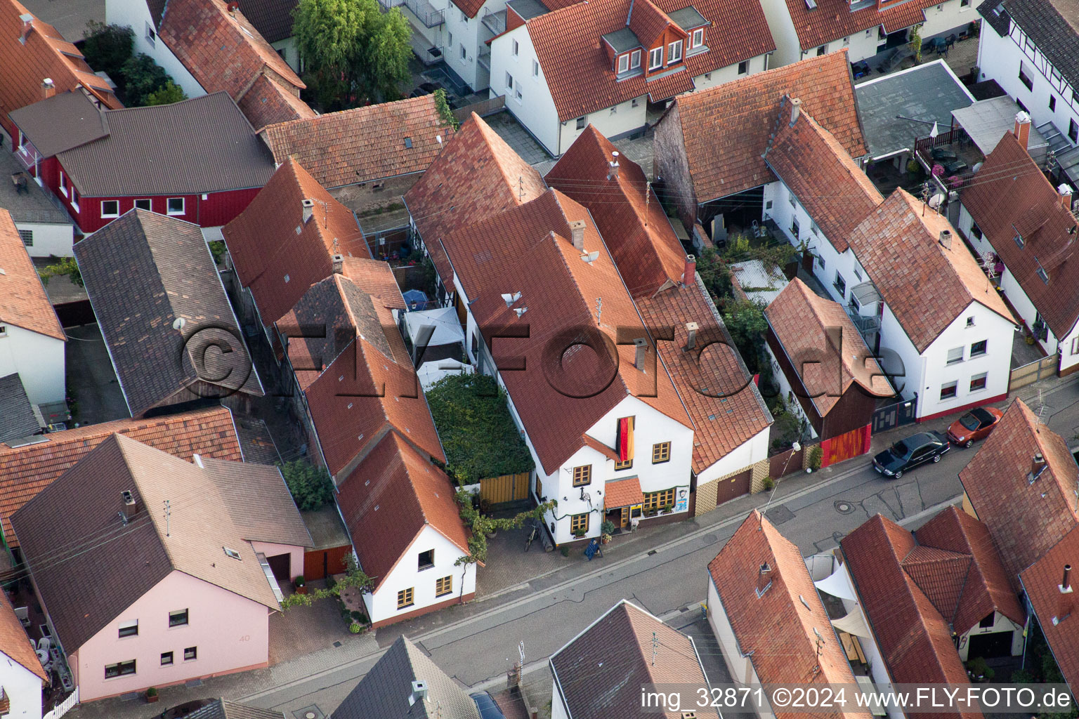 Oblique view of Juiststraße, Zum Schloddrer restaurant in Kandel in the state Rhineland-Palatinate, Germany