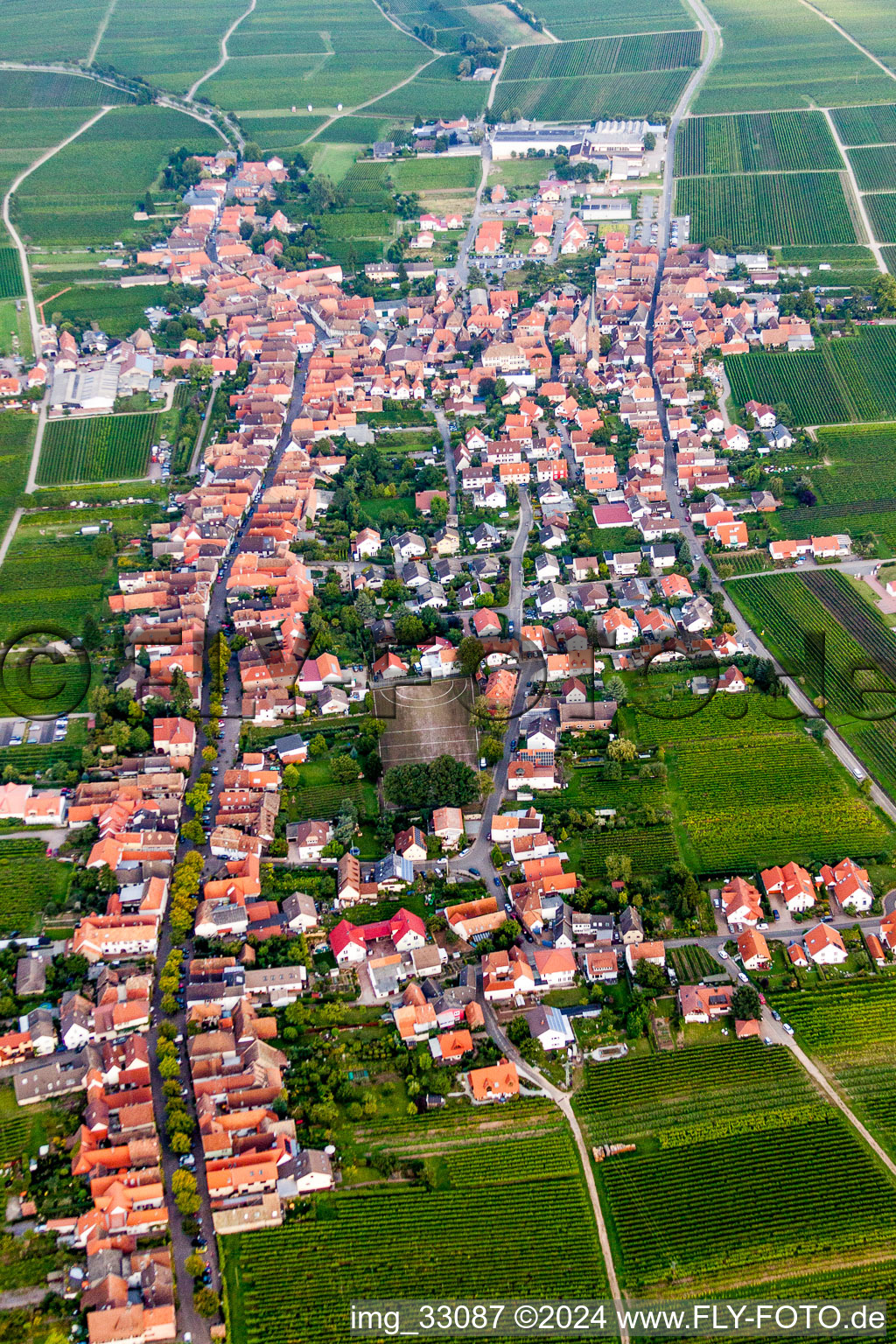 Aerial photograpy of Village - view on the edge of agricultural fields and farmland in Rhodt in the state Rhineland-Palatinate, Germany